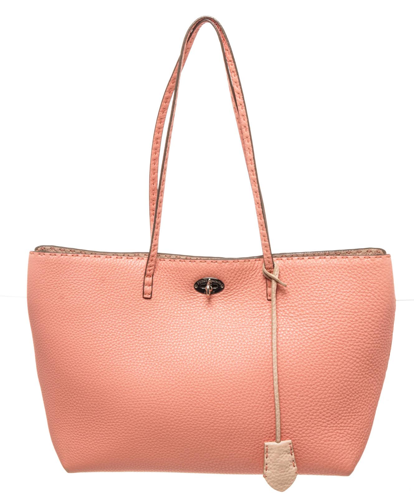 Fendi Pink Leather Selleria Tote Bag withÂ gold-toneÂ hardware, trim leather, shoulder strapÂ andÂ flapÂ closure.

49372MSCÂ