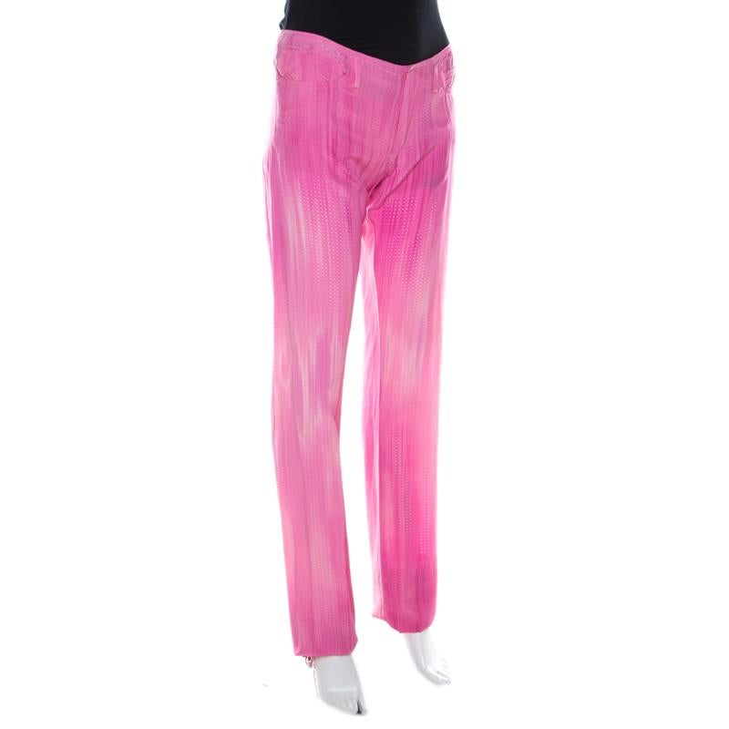 Trousers are an essential wardrobe staple and these pink ones from Fendi are sure to be an amazing addition to your collection! The trousers are made of 100% silk and feature perforated dots all over. Grab them right away!

Includes: Price Tag