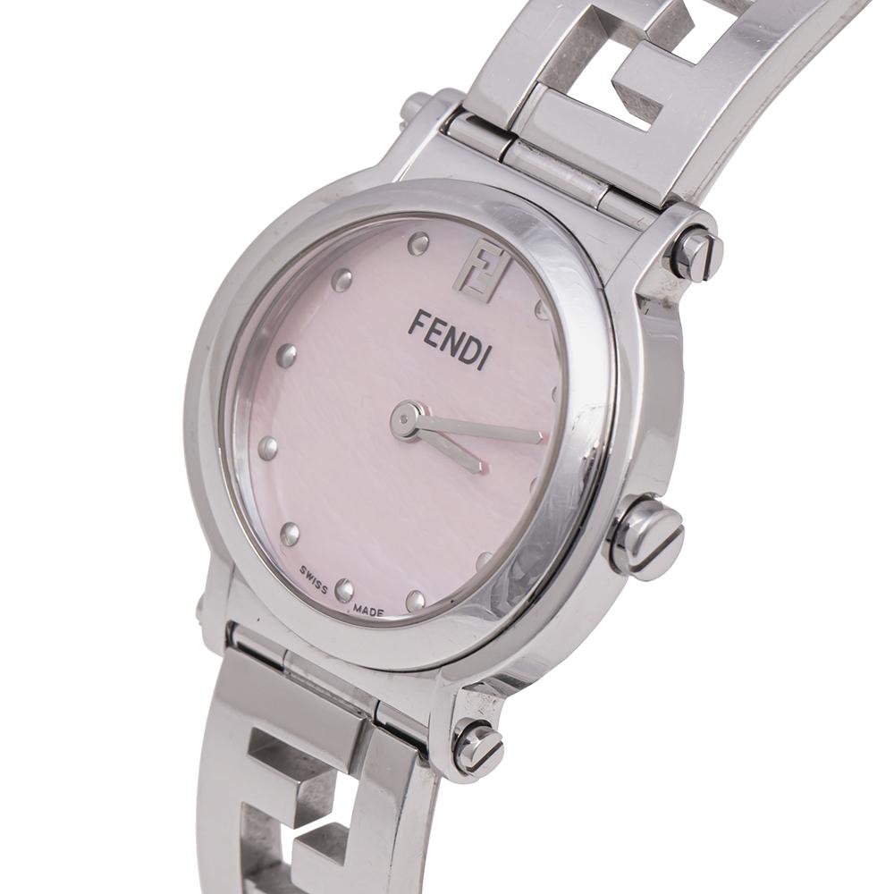This Fendi watch is crafted from stainless steel and it carries engravings on the case back. The watch has a mother of pearl dial with two hands, stud hour markers, and the FF logo at 12. It follows a quartz movement and is water-resistant up to 50