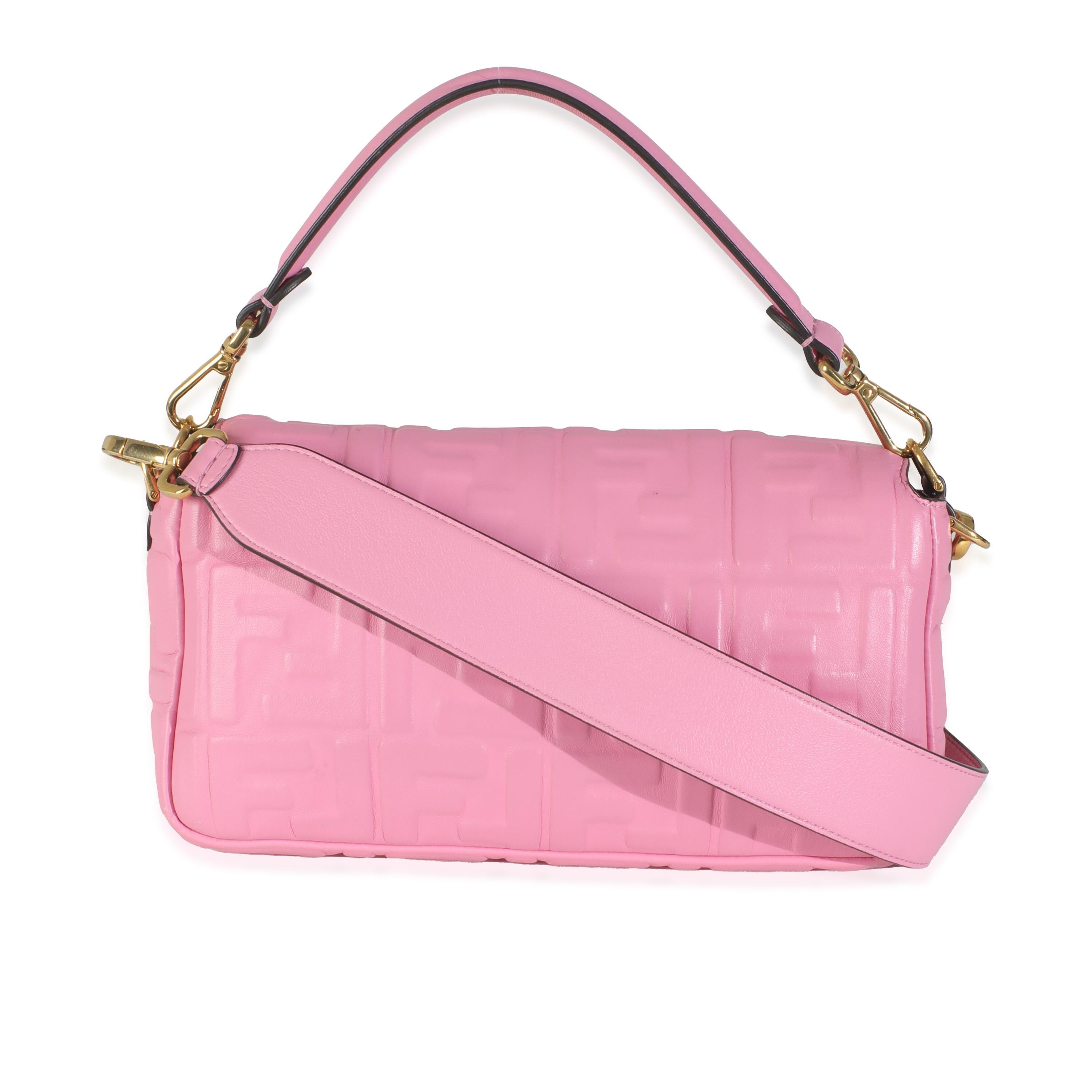 Listing Title: Fendi Pink Nappa FF 1974 Embossed Baguette Bag
SKU: Z145727
Condition: Pre-owned 
Condition Description: A Fendi classic. The Baguette bag is synonymous with the early 2000s and made a name for itself in an early episode of Sex & The