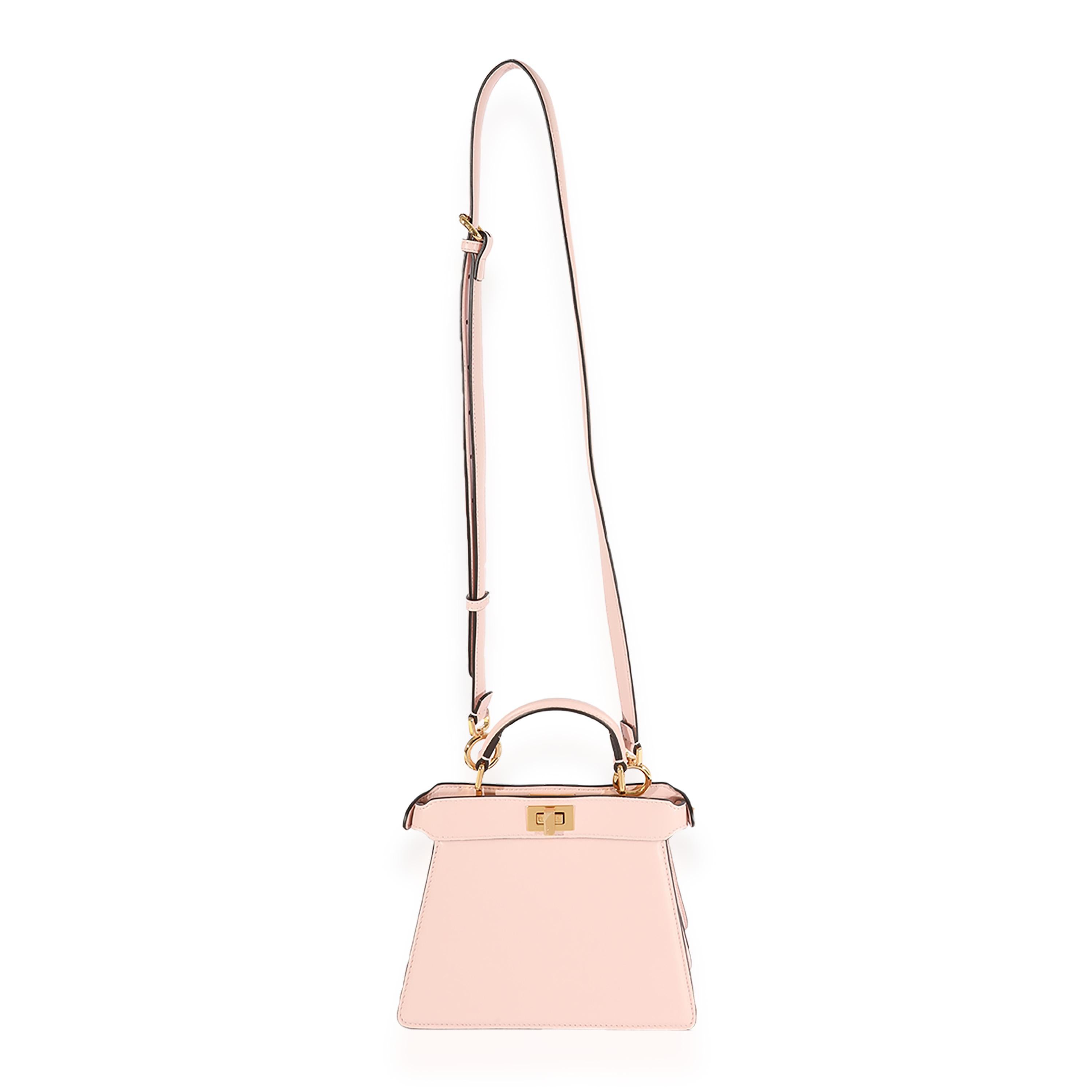Listing Title: Fendi Pink Padded Nappa Leather Peekaboo ISeeU Petite
SKU: 123411
MSRP: 3750.00
Condition: Pre-owned 
Handbag Condition: Excellent
Condition Comments: Excellent Condition. Plastic on some hardware. No visible signs of wear.
Brand: