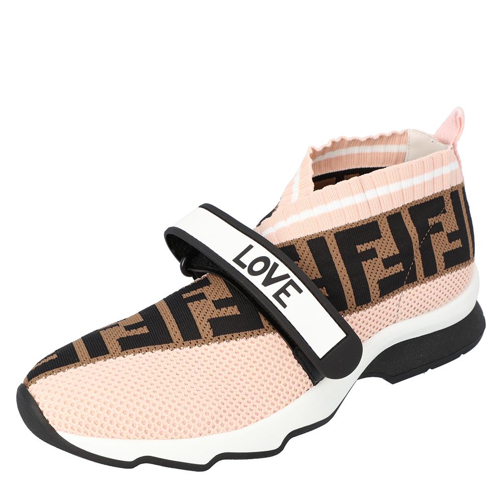 Enjoy footwear ease with this pair of Rockoko sneakers by Fendi. They've been crafted from knit fabric and designed with the Zucca logo and FENDI-LOVE velcro straps. Equipped with comfortable insoles and tough rubber soles, they are easy to slip on