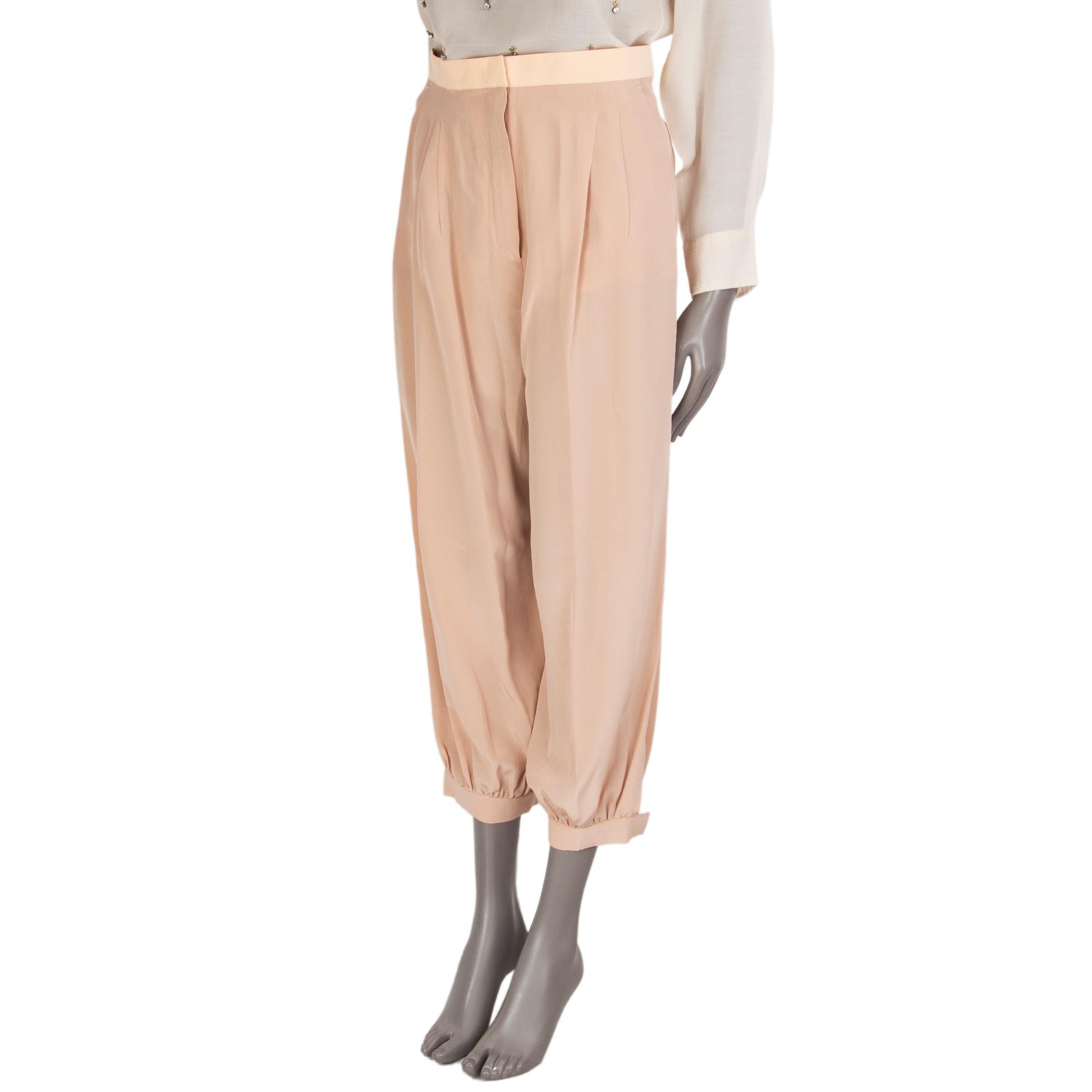 100% authentic Fendi harem pants in nude silk-blend (probably as content tag is missing) with two pockets on the front, two stitched welt-pockets on the back and buttoned slit cuffs. Close with a concealed zipper, a hook and a jigger-button.