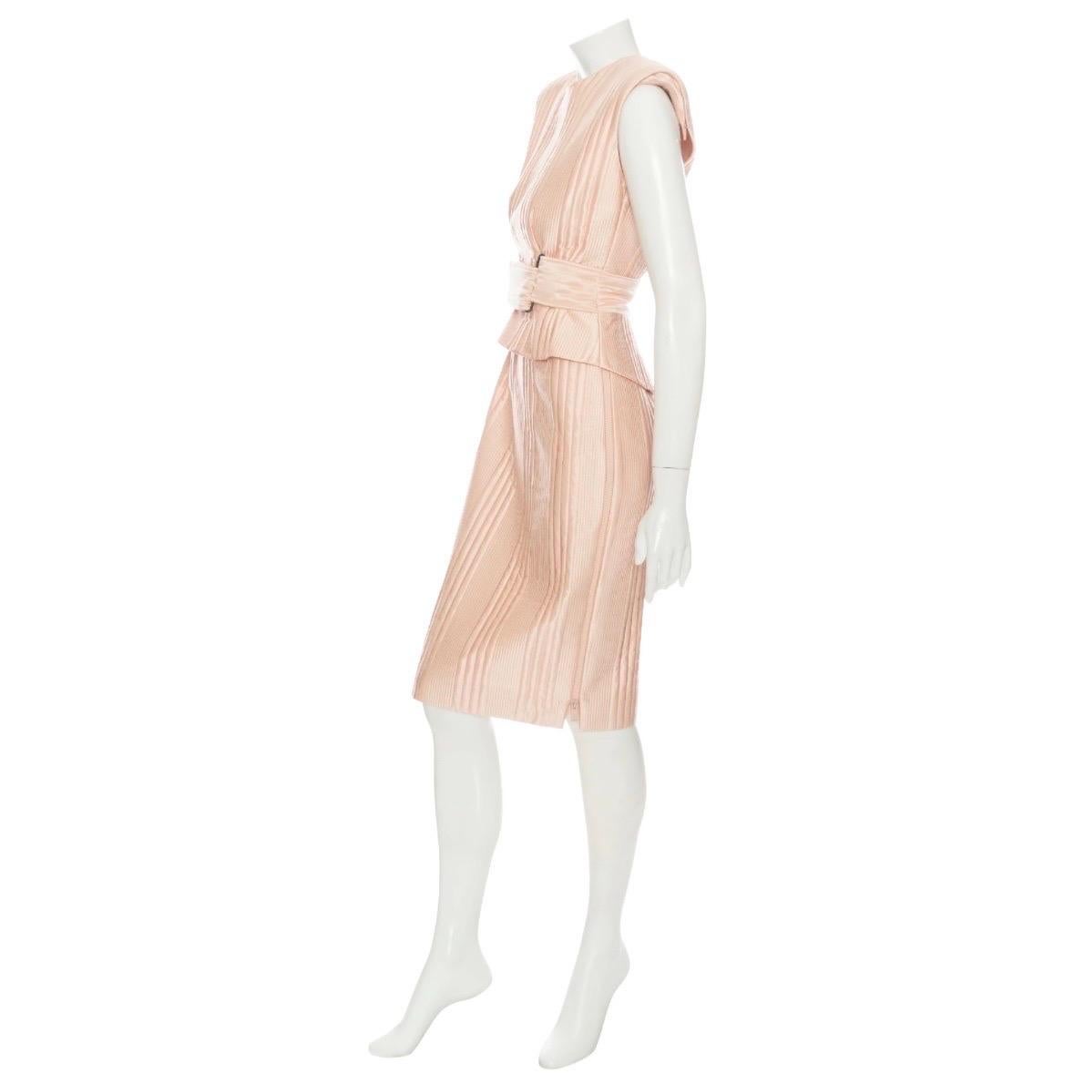 Fendi Pink Silk Quilted Peplum Dress

Light Pink/Blush
Quilted detailing
Sleeveless
High round neck
Padded shoulders
Peplum bodice
Pencil skirt
Attached wide waist belt
Back vent
Adjustable side zippers
Back zipper closure
Made in Italy
100%