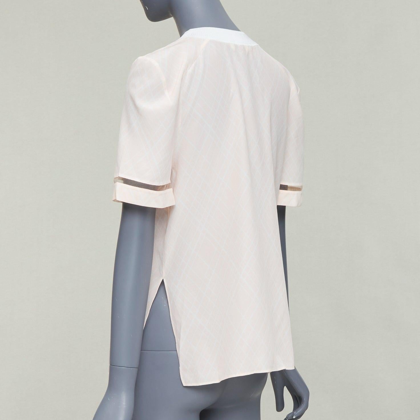 FENDI rosa sedoso nude FF monograma cuello redondo a cuadros rombos top manga corta en venta 1