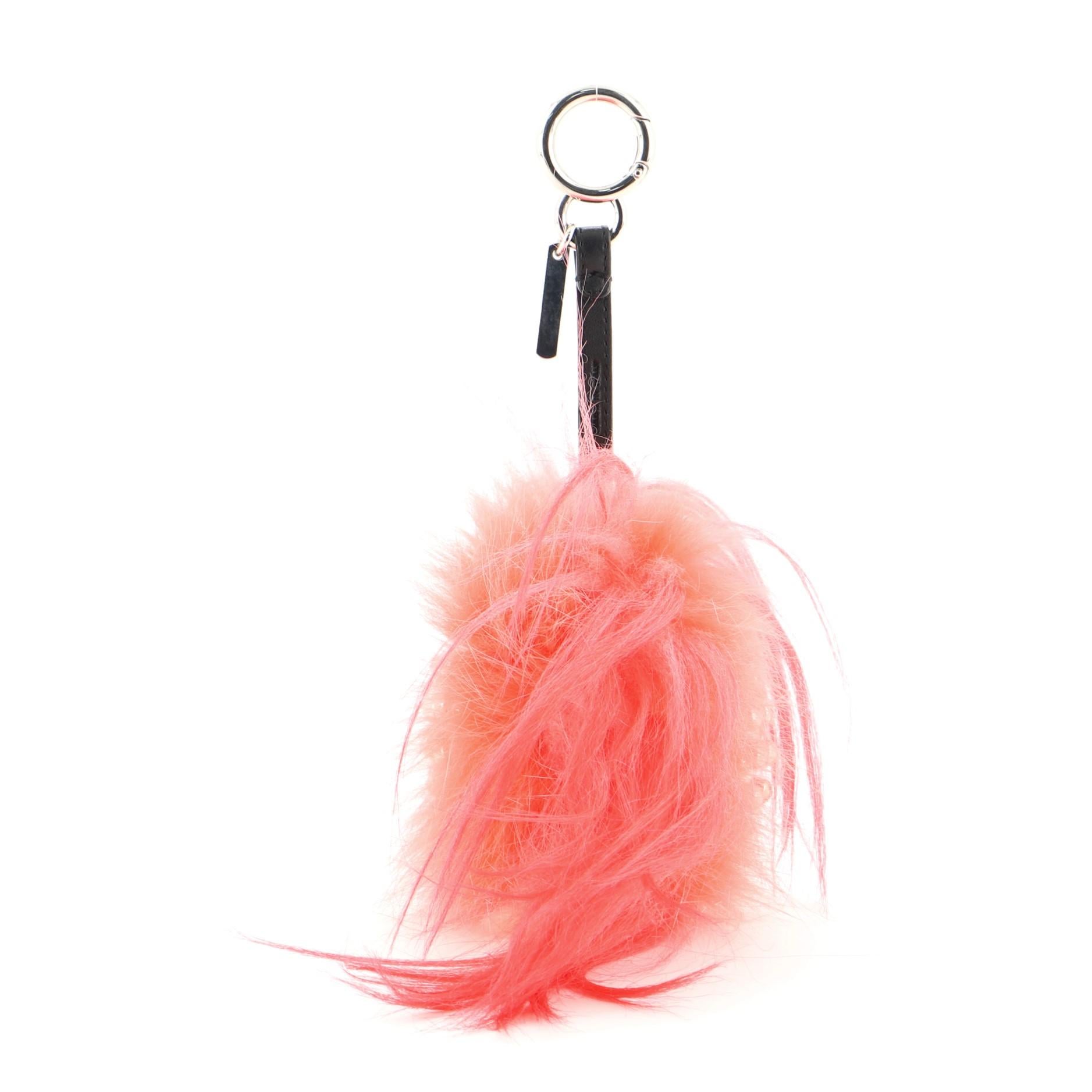 Fendi Punkito Karlito Bag Charm Studded Leather with Fur
Neutral, Pink

Condition Details: Minor wear and small glue stain on exterior, scratches and slight tarnish on hardware.

51879MSC

Height 4.5