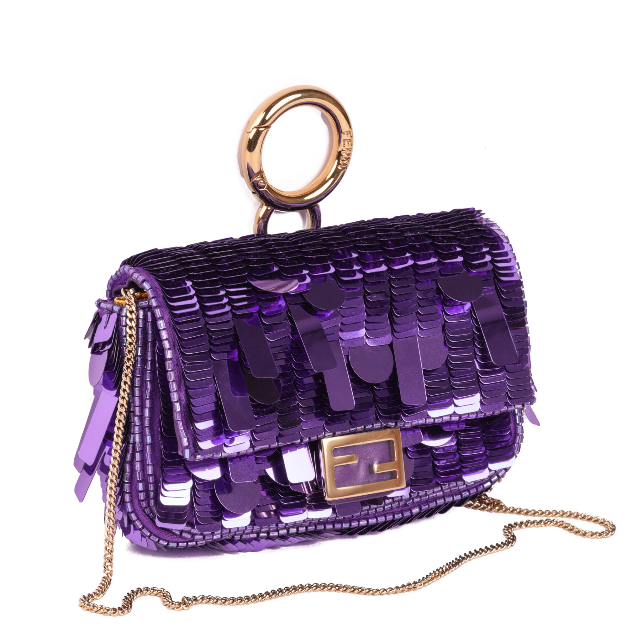 Fendi Purple Embellished Sequin & Purple Calfskin Leather Nano Baguette Charm

CONDITION NOTES
The exterior in is exceptional condition with no signs of use.
The interior is in exceptional condition with no signs of use.
The hardware is in
