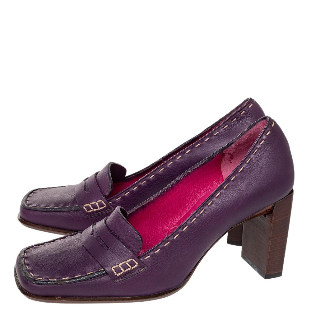 Specialising in sophisticated leather goods, the Italian fashion brand Fendi has made these elegantly trendy loafer pumps. In purple-colored leather, these shoes feature block heels and rounded toes for added comfort for longer wear.

