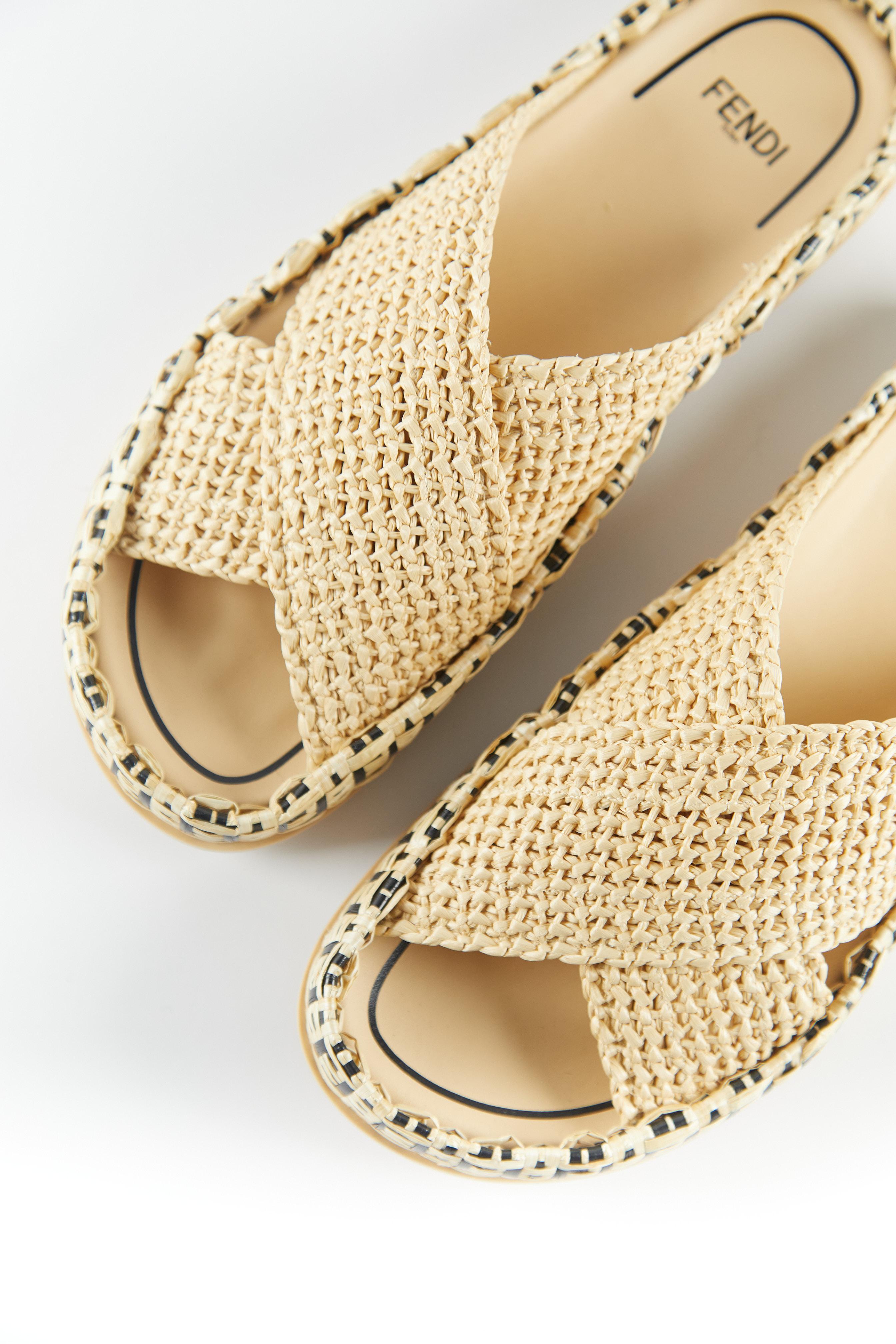 Fendi Raffia Slides Natural

Beige and black raffia Slides

Sole approximately 20mm/ 1 inch

Comes with box & dustbag

Made in Italy