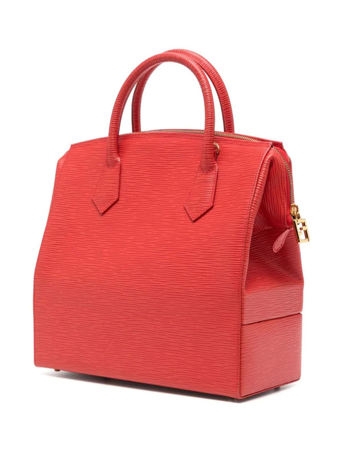 Fendi Vintage 90's Red Epi Leather Top Handle Crossbody Vanity Train Case 

Gold hardware
Exterior red epi leather
FF Fendi Logo charm zipper pull
Soft beige  nubuck leather interior
Exterior luggage number lock 
Main interior zippered pocket at