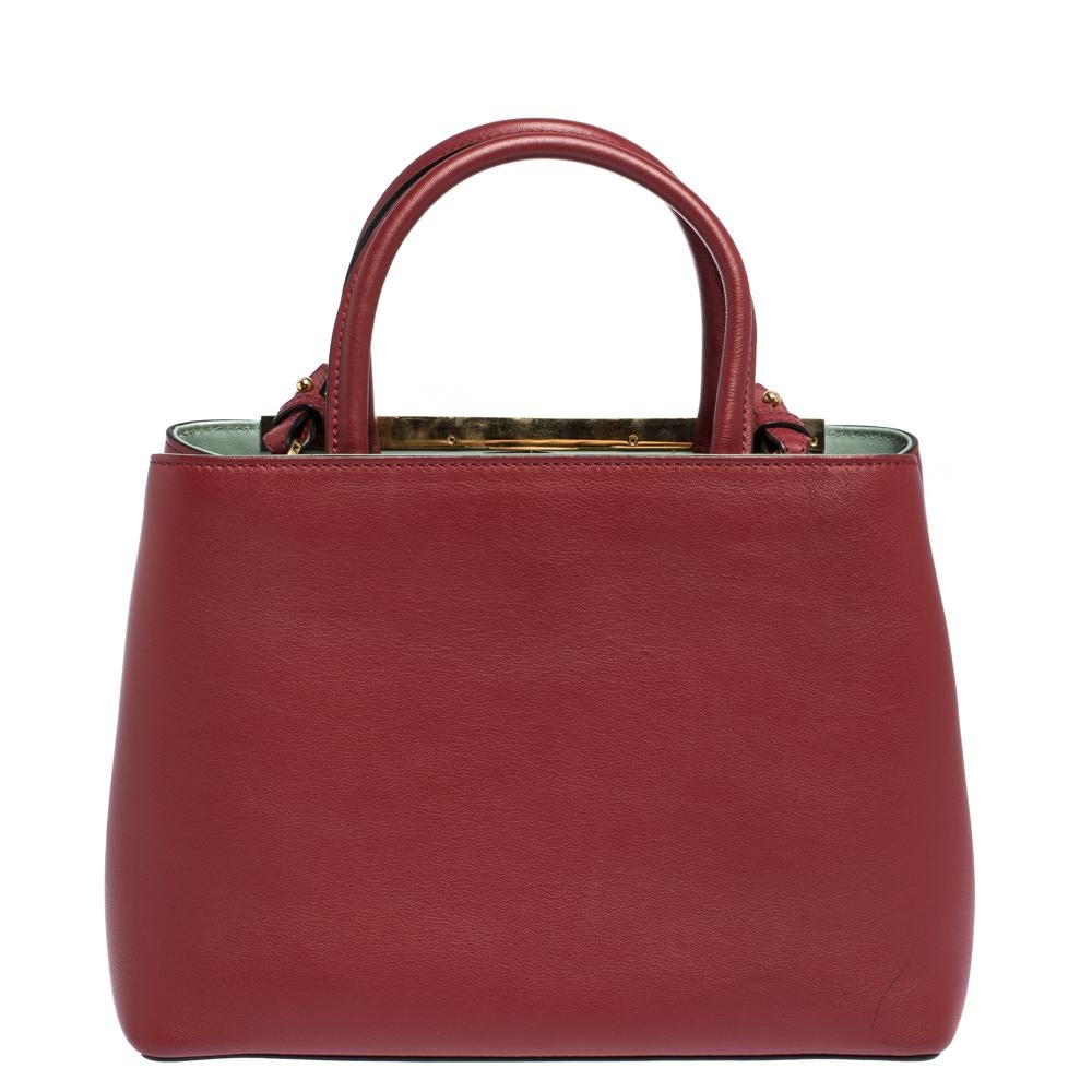 Fendi's 2Jours tote is one of the most iconic designs from the label and it still continues to receive the love of women around the world. Crafted from red leather, the bag features double rolled handles. It is also equipped with a leather interior