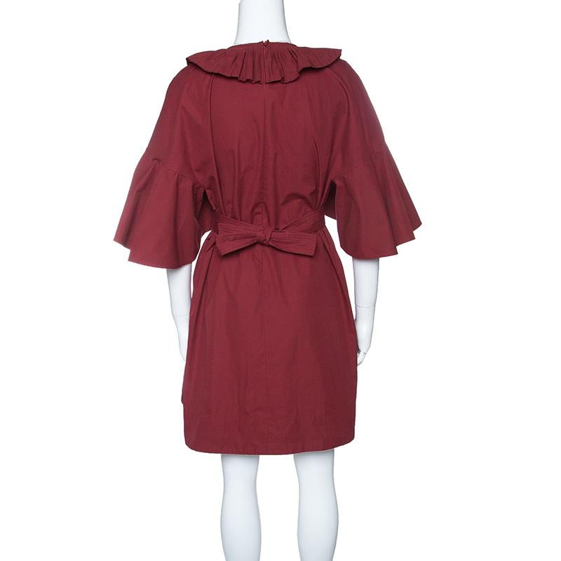 A perfect dress to get your ready for parties and special events, this Fendi cocktail dress is sure to steal your heart. Constructed in red cotton fabric, this dress features beautifully ruffled trims all over the front along with bow detail at the