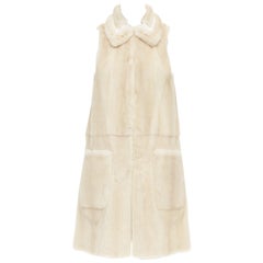 FENDI Wendbarer Westenmantel aus beigefarbenem Pelz und champagnergoldem Leder mit Metallic-Beleuchtung IT36 XXS