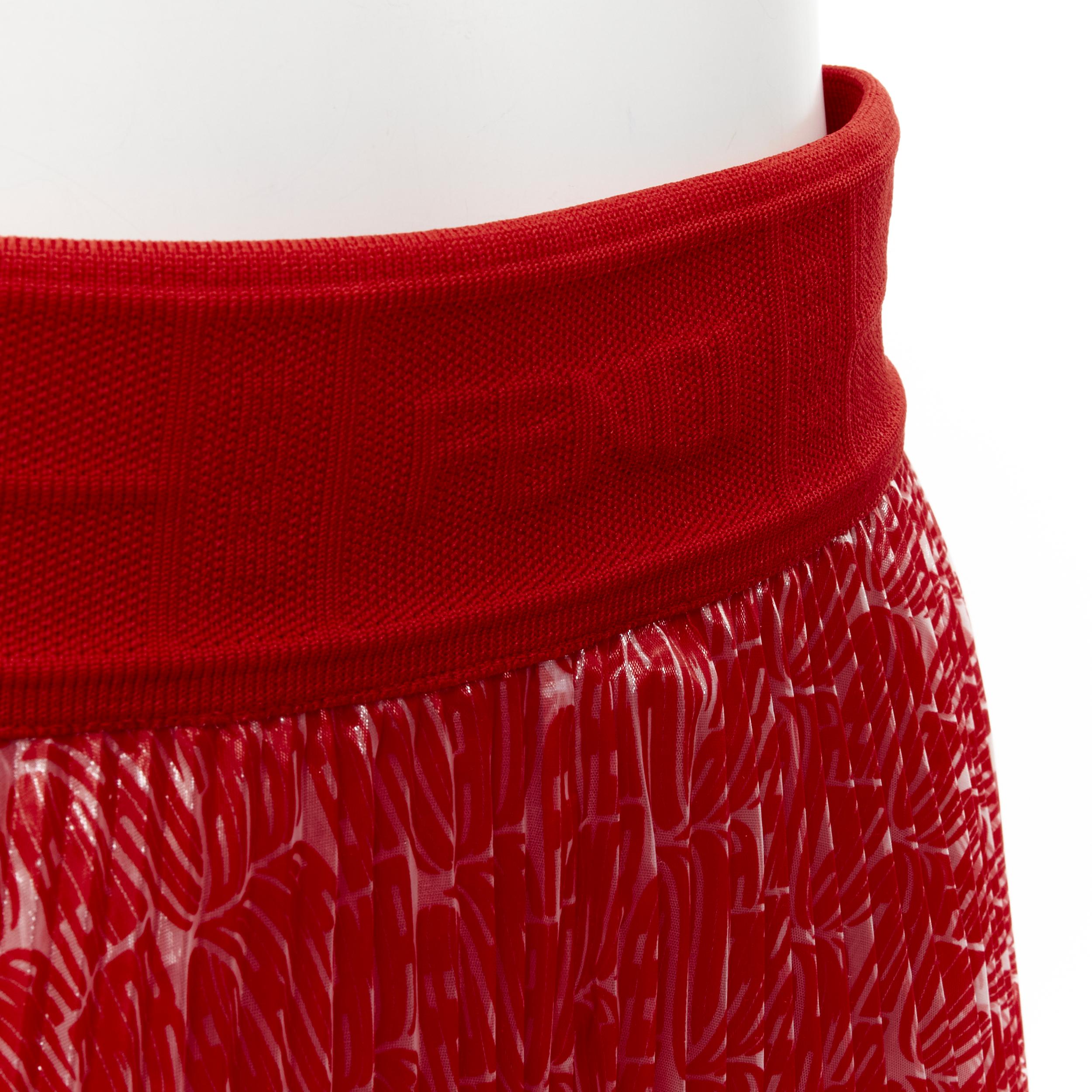 FENDI Roma Amor red graphic print pleated polyester plisse skirt IT42 M
Brand: Fendi
Collection: Roma Amor 
Material: Polyester
Color: Red
Pattern: Graphic
Closure: Zip
Extra Detail: Fendi logo embossed on stretch waist badn. Zip side closure.
Made