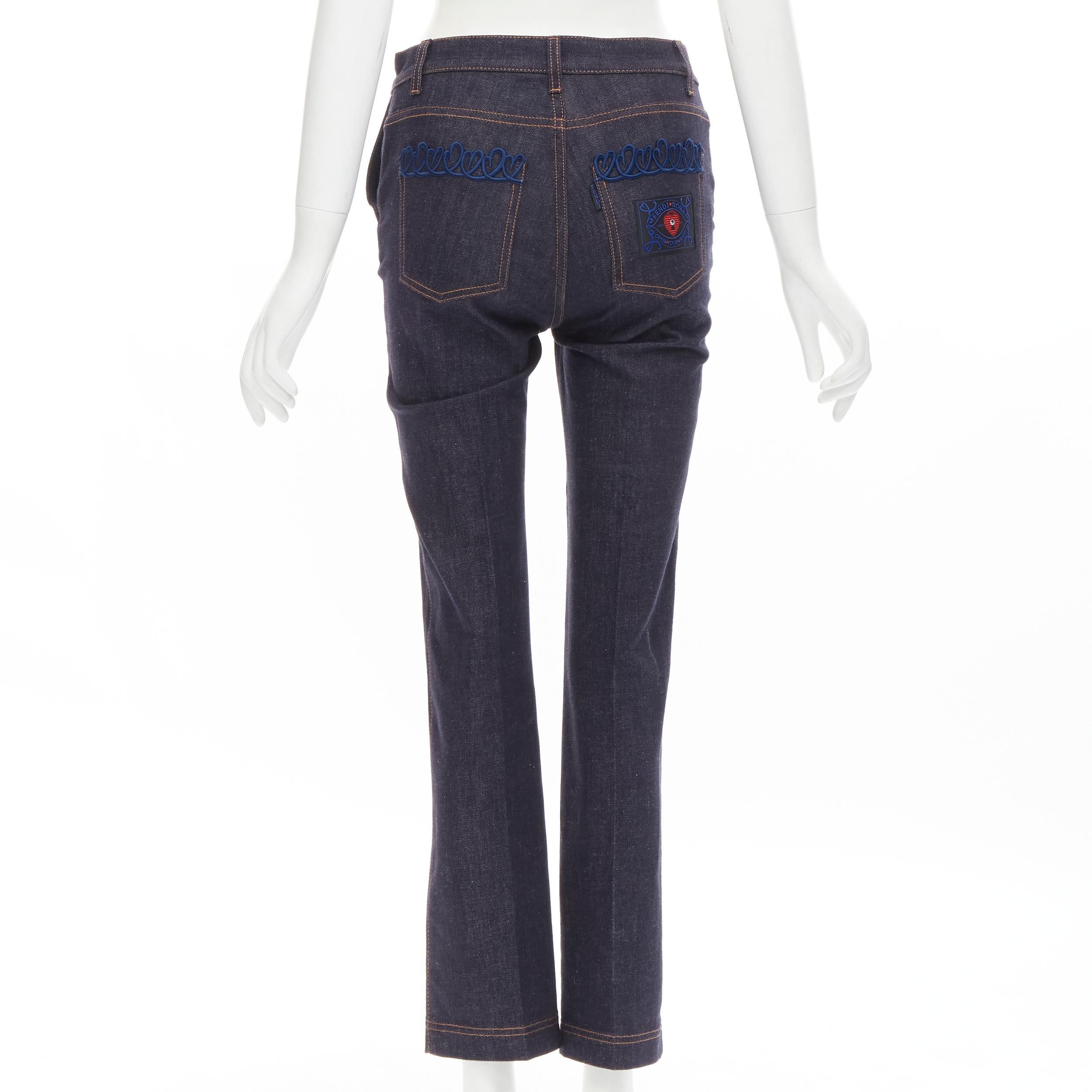FENDI ROMA Open Your Heart scribble embroidery indigo blue jeans
Brand: Fendi
Collection: Open Your Heart 
Material: Feels like cotton
Color: Blue
Pattern: Solid
Closure: Zip
Extra Detail: Silver F button. 4-pocket. Embroidery on back