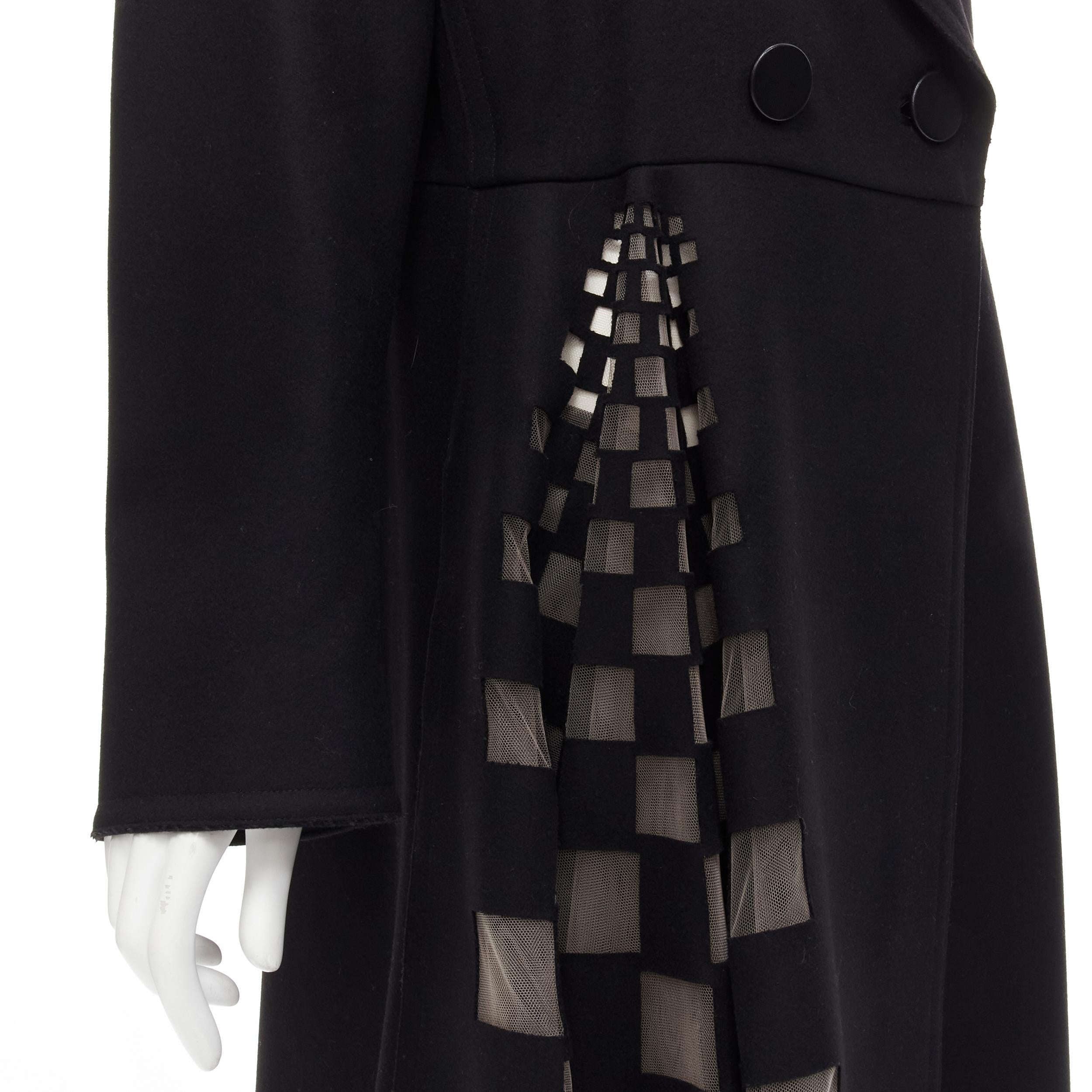 FENDI Runway black fleece wool checkered cut out mesh flared coat dress IT48 XL 
Reference: GIYG/A00177 
Brand: Fendi 
Material: Wool 
Color: Black 
Pattern: Solid 
Closure: Button 
Extra Detail: Black fleece wool. Spread collar. Leather wrapped