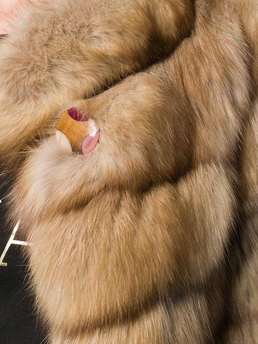 Crafted in Italy from pure brown sable fur, this pre-owned jacket by Fendi features a distinctive quilted exterior, half-sleeves and an open front. Falling just above the waist and elegantly finished with a soft silk interior lining, this