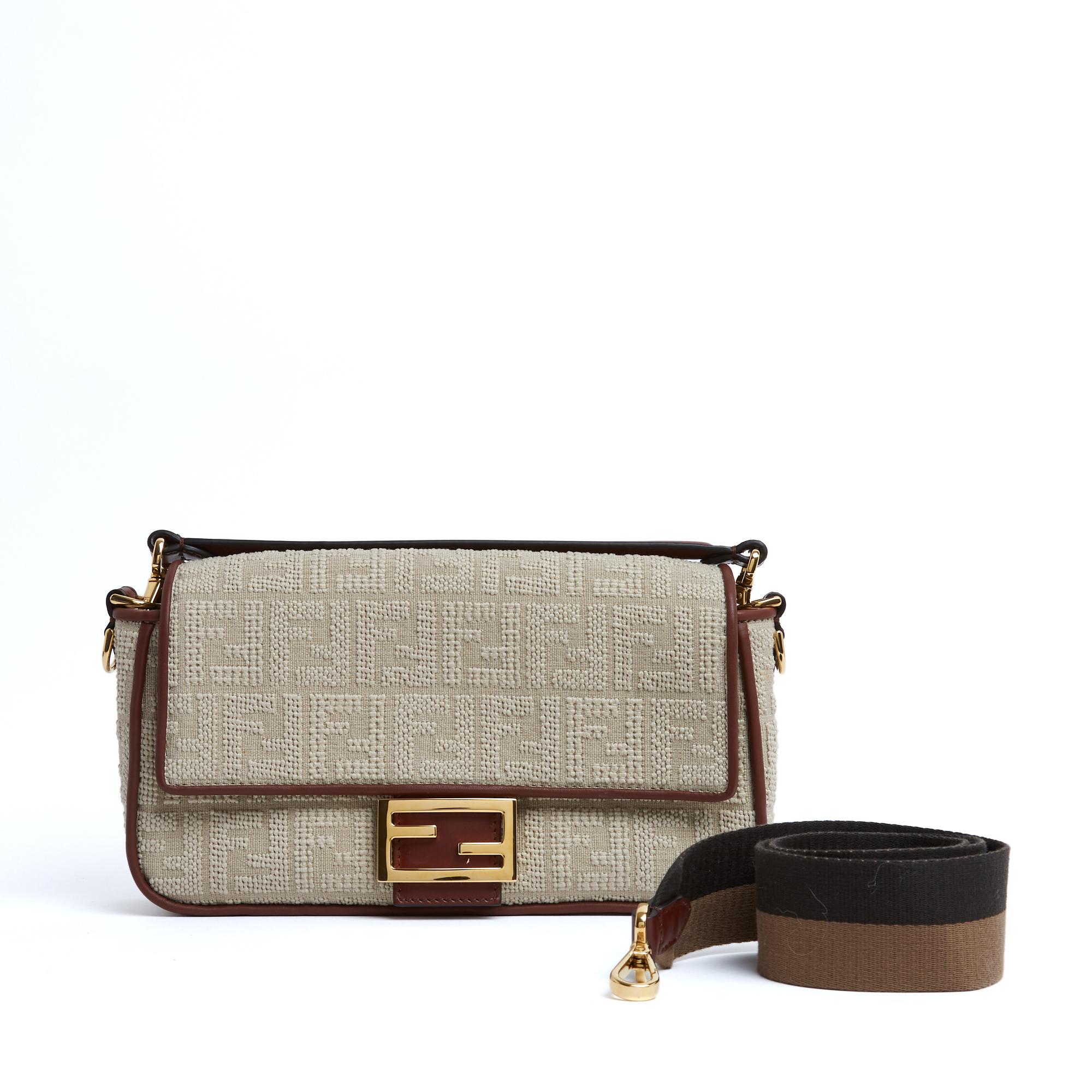 Fendi Baguette bag, medium size, in raw beige canvas embroidered with the FF or Zucca motif in different sized stitches, piping and magnetic closure tab in burgundy fawn leather, beige canvas interior with a zipped pocket, 1 short handle in matching