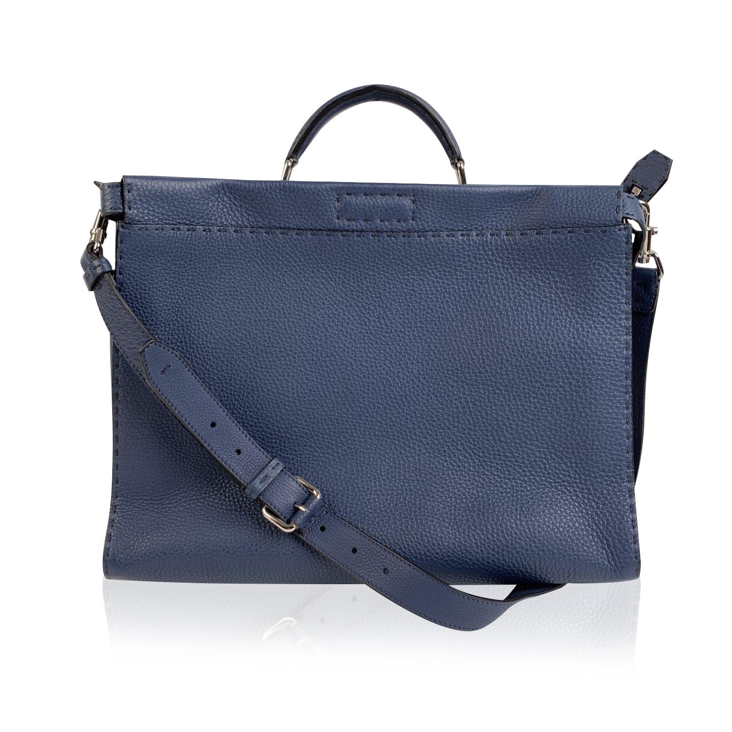 This beautiful Bag will come with a Certificate of Authenticity provided by Entrupy. The certificate will be provided at no further cost.

Beautiful Fendi Selleria 'Peekaboo Iconic Medium' tote bag in light blue pebbled leather. The bag features 2