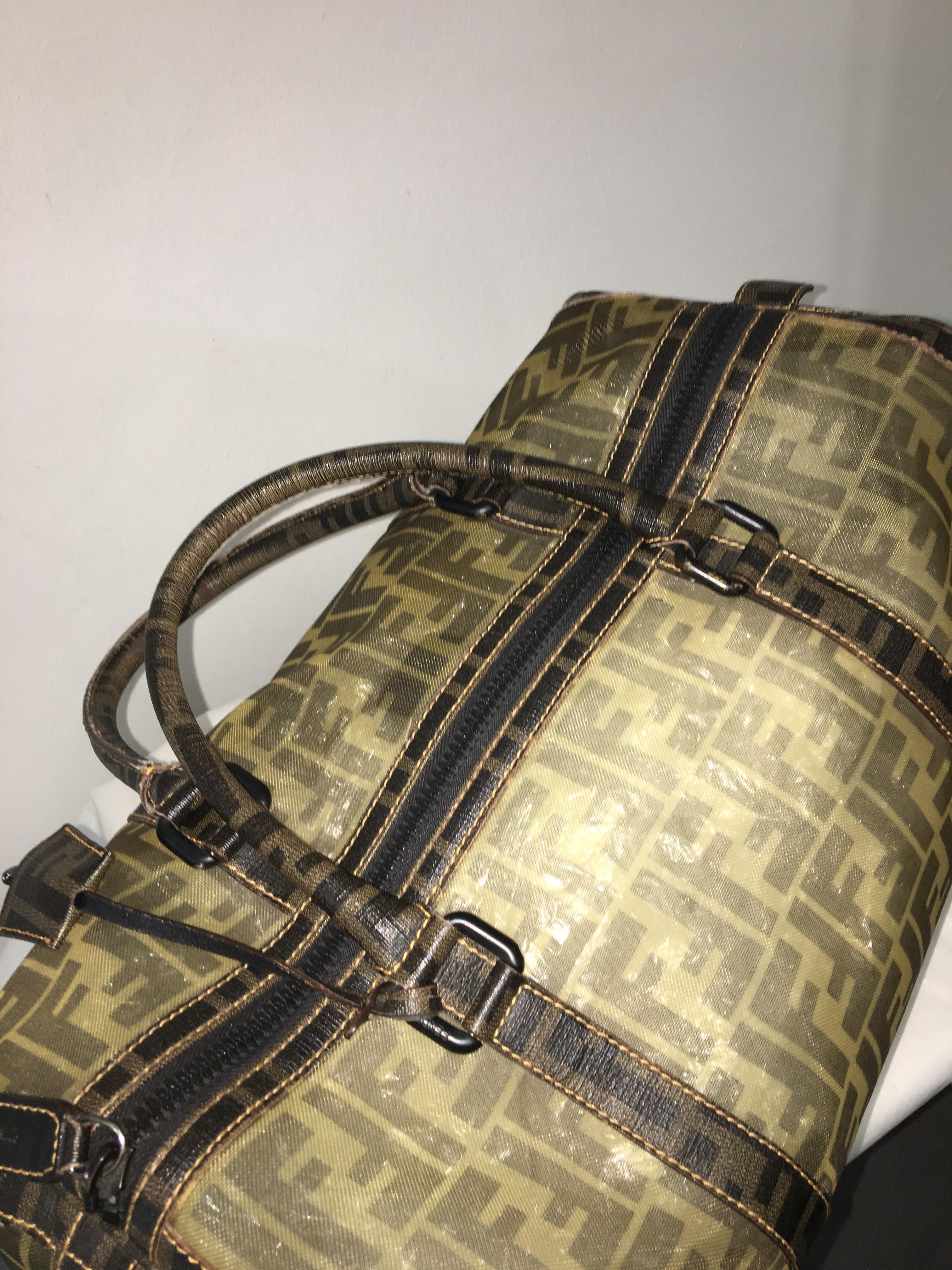 Authentic large-sized Fendi Boston bag.
The Fendi Bag is made from very tight mesh that makes the bag relatively transparent.
The bag is in good condition with minor signs of wear.
Measurements: 40 x 24 x 20.