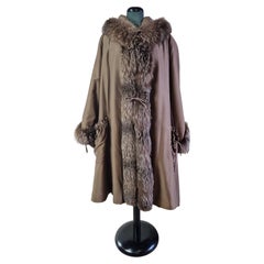 Fendi silk coat with fur interior.