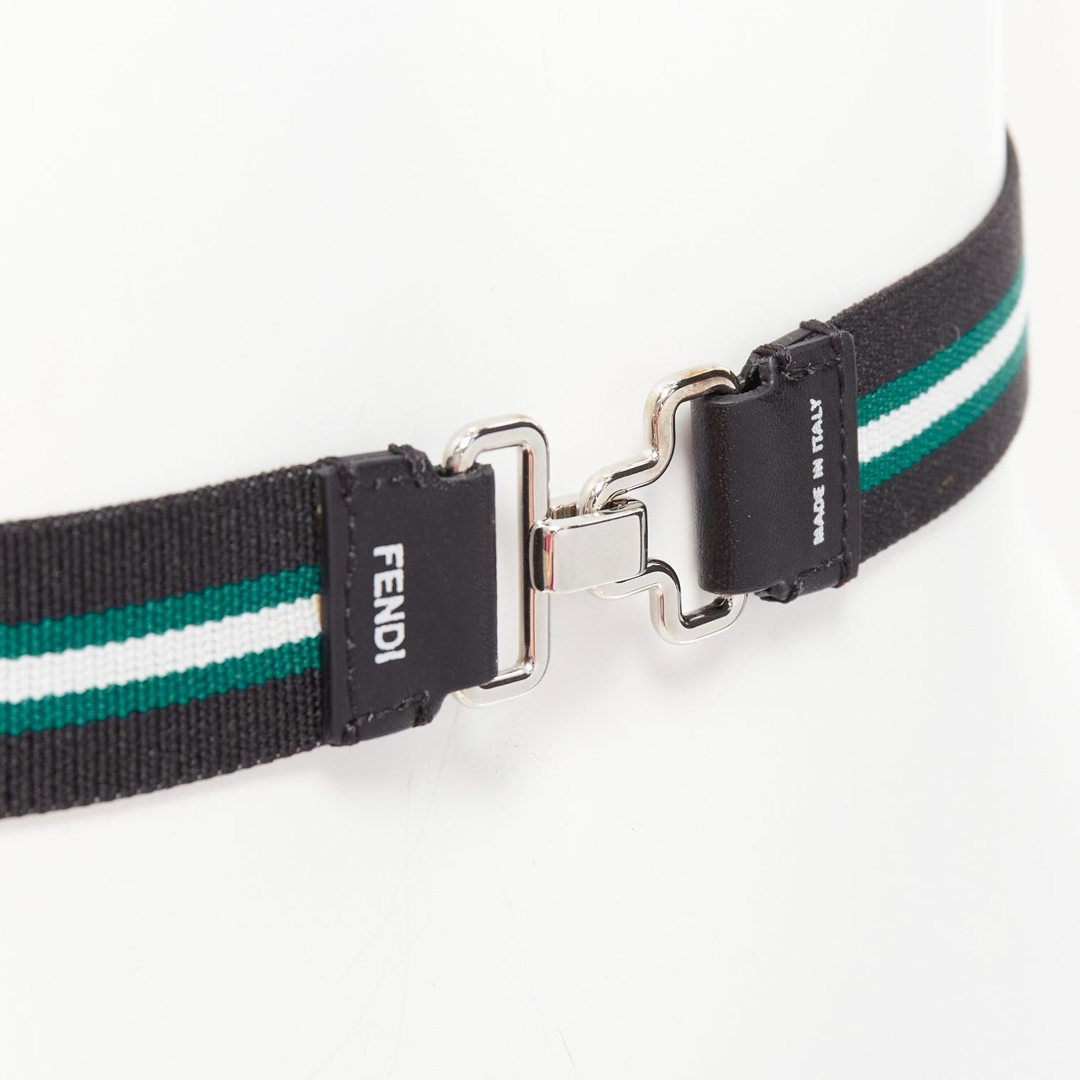 FENDI silver logo black green stripe stretch fabric leather skinny belt
Reference: AAWC/A01193
Brand: Fendi
Material: Leather, Metal, Fabric
Color: Green, Black
Pattern: Striped
Closure: Hook & Bar
Lining: Multicolour Fabric
Extra Details:
