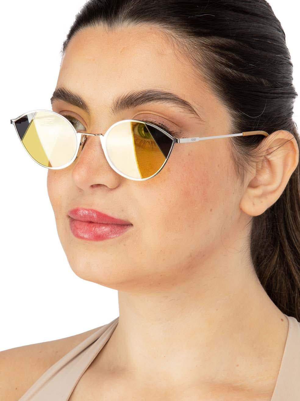 CONDITION is New with tags on this brand new Fendidesigner item. This item comes with original packaging.
 
 
 
 Details
 
 
 Model: FF0342S B1ZHO
 
 Silver
 
 Metal
 
 Cat Eye Sunglasses
 
 Tinted Yellow Lens
 
 Branding at the arms
 
 Full-Rim
 
