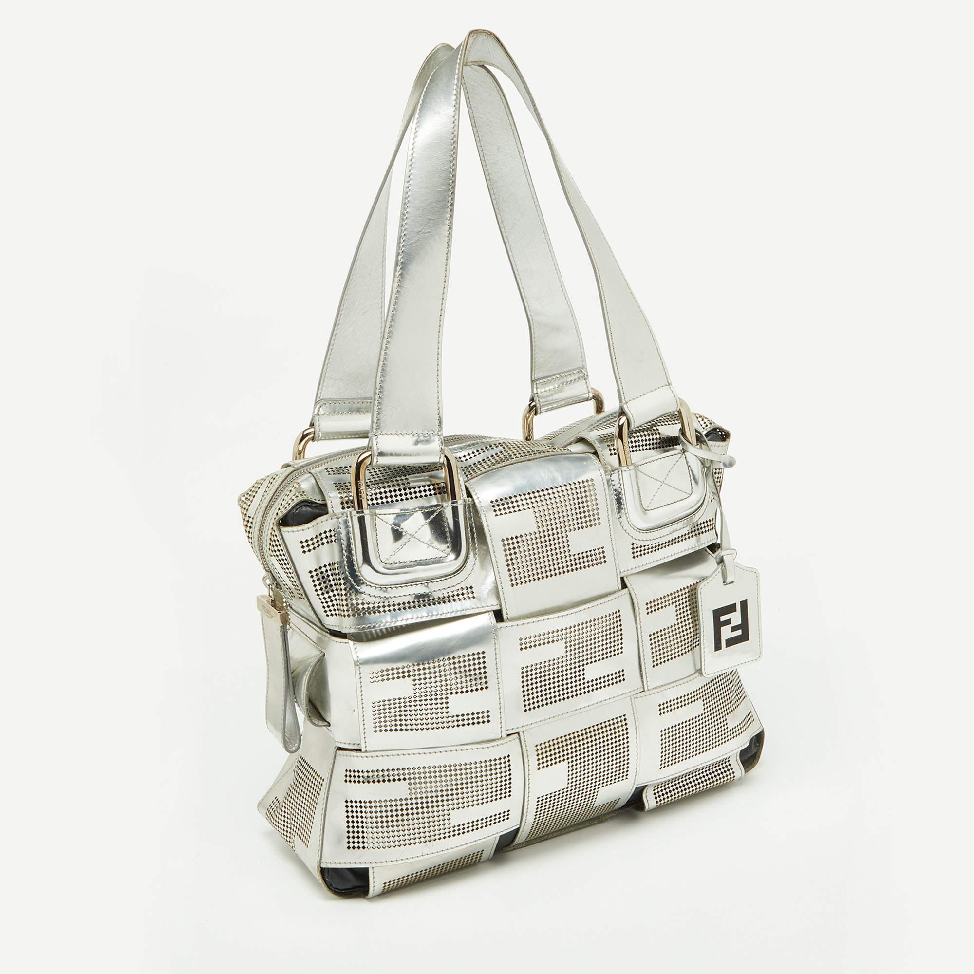 Functional and stylish, this designer label's collections capture the effortless, elegant finesse of the modern woman. Crafted from quality materials, this chic bag is easy to carry and can fit in your daily essentials effortlessly.

