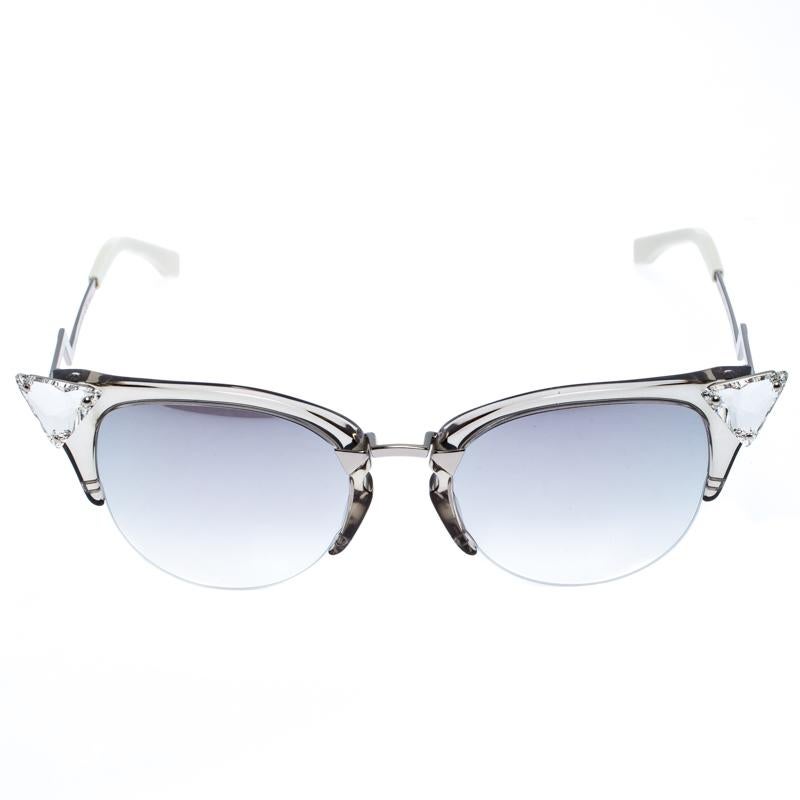 Futuristic and uber edgy, this pair of sunglasses by Fendi is a buy you won't regret. It's so stylish, it'll effortlessly represent the fashionista in you. Made of acetate and silver-tone metal into a cat-eye shape, the piece has crystal accents on