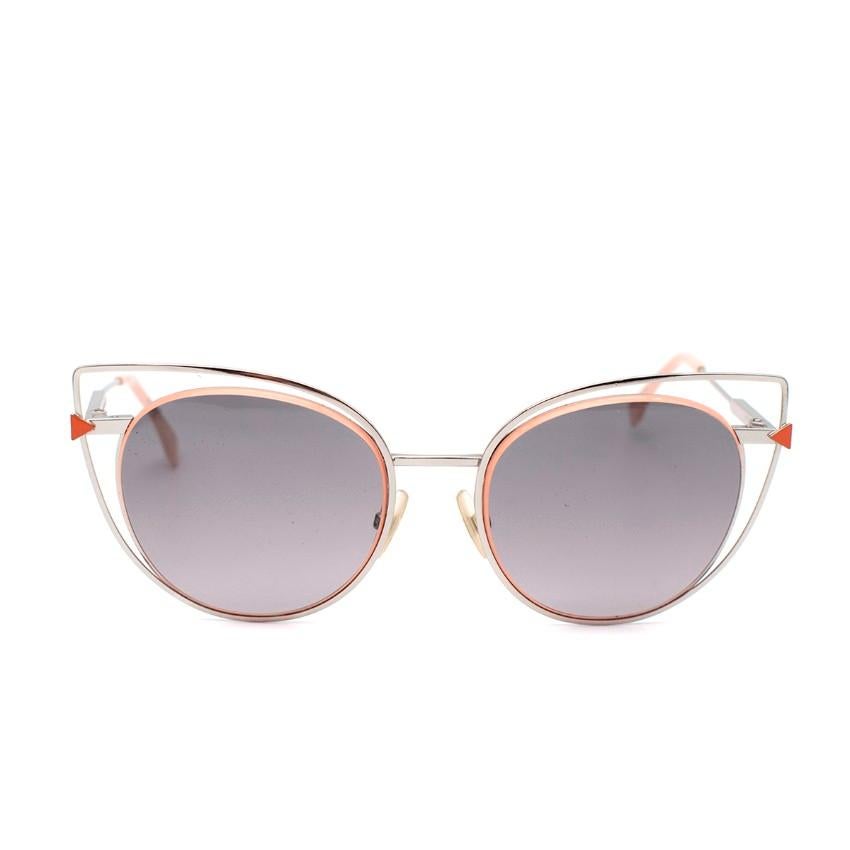 Fendi Silver-Tone Metal & Light Coral Cat Eye Sunglasses
 

 - Cut-out cat-eye silhouette rendered in silver-tone metal
 - Light coral tone accents 
 - Slender arm with branding on the temple
 

 Materials:
 Metal
 

 Made in Italy
 

 PLEASE NOTE,