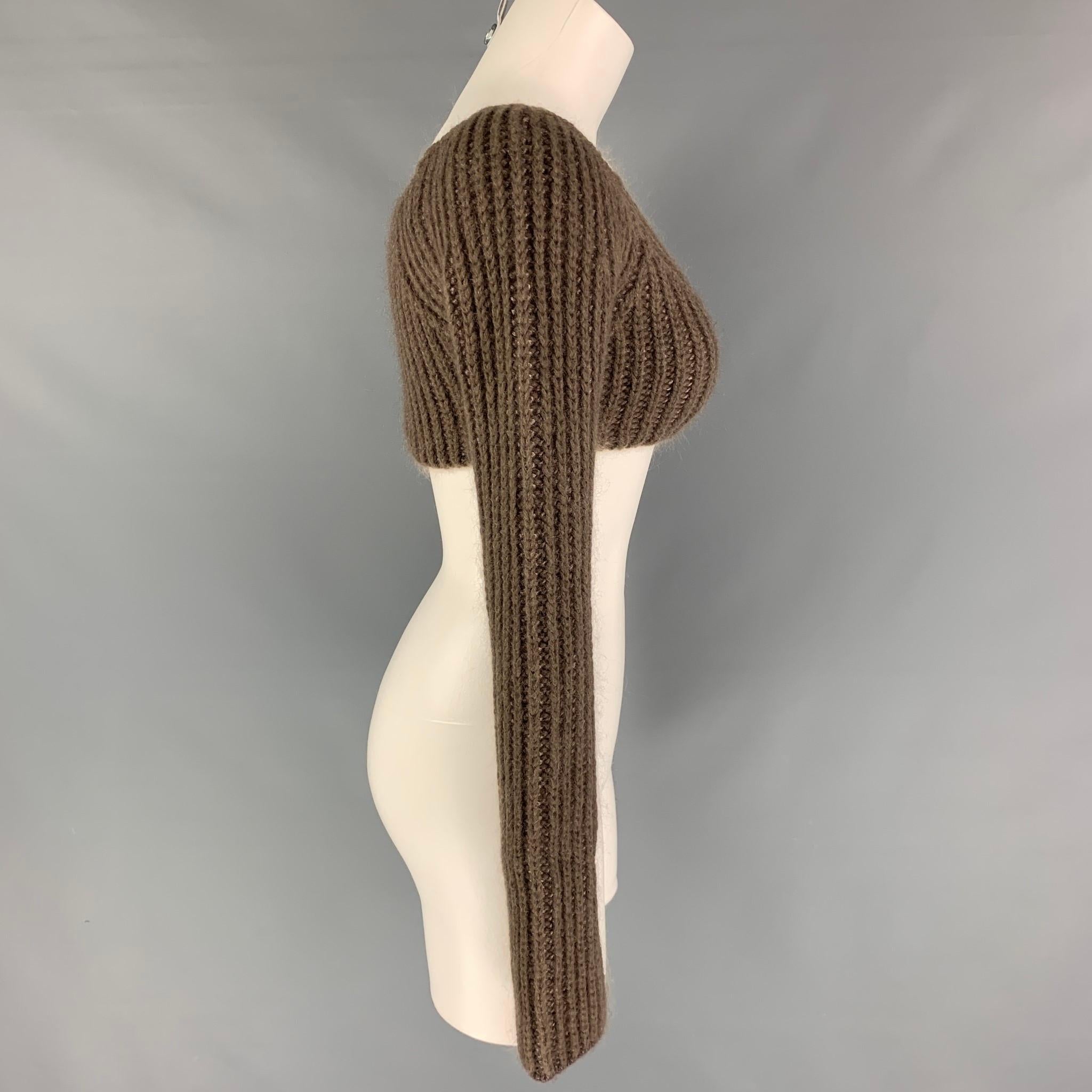 FENDI top comes in a taupe mohair / silk featuring a cropped style, off the shoulder, and long sleeves. Matching skirt sole separately. Made in Italy.

Excellent Pre-Owned Condition.
Marked: 38
Original Retail Price: