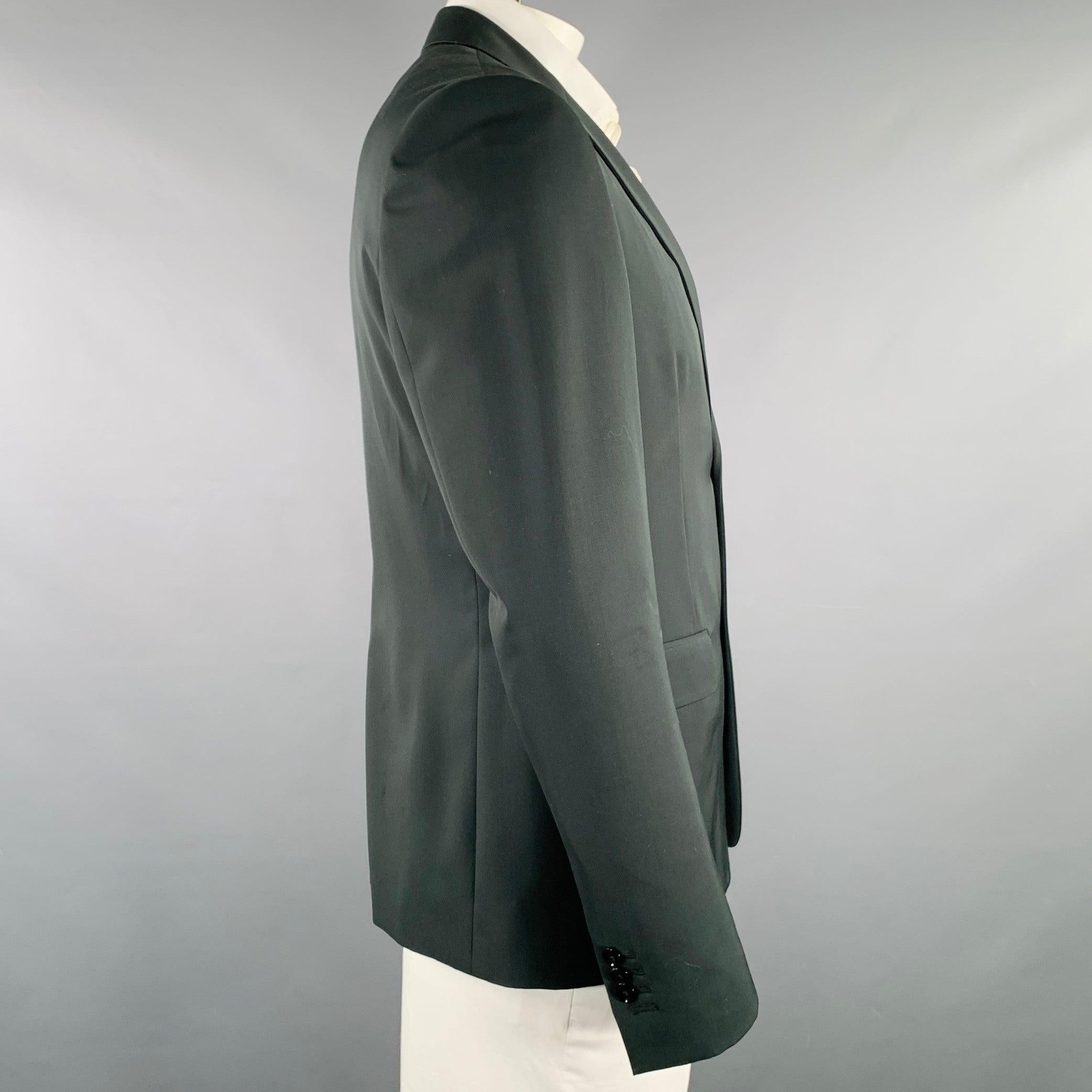 FENDI sport coat
in a charcoal grey wool fabric featuring a notch lapel, double vented back, and double button closure. Made in Italy.New with Tags. 

Marked:   IT 52 

Measurements: 
 
Shoulder: 16.5 inches Chest: 42 inches Sleeve: 26 inches