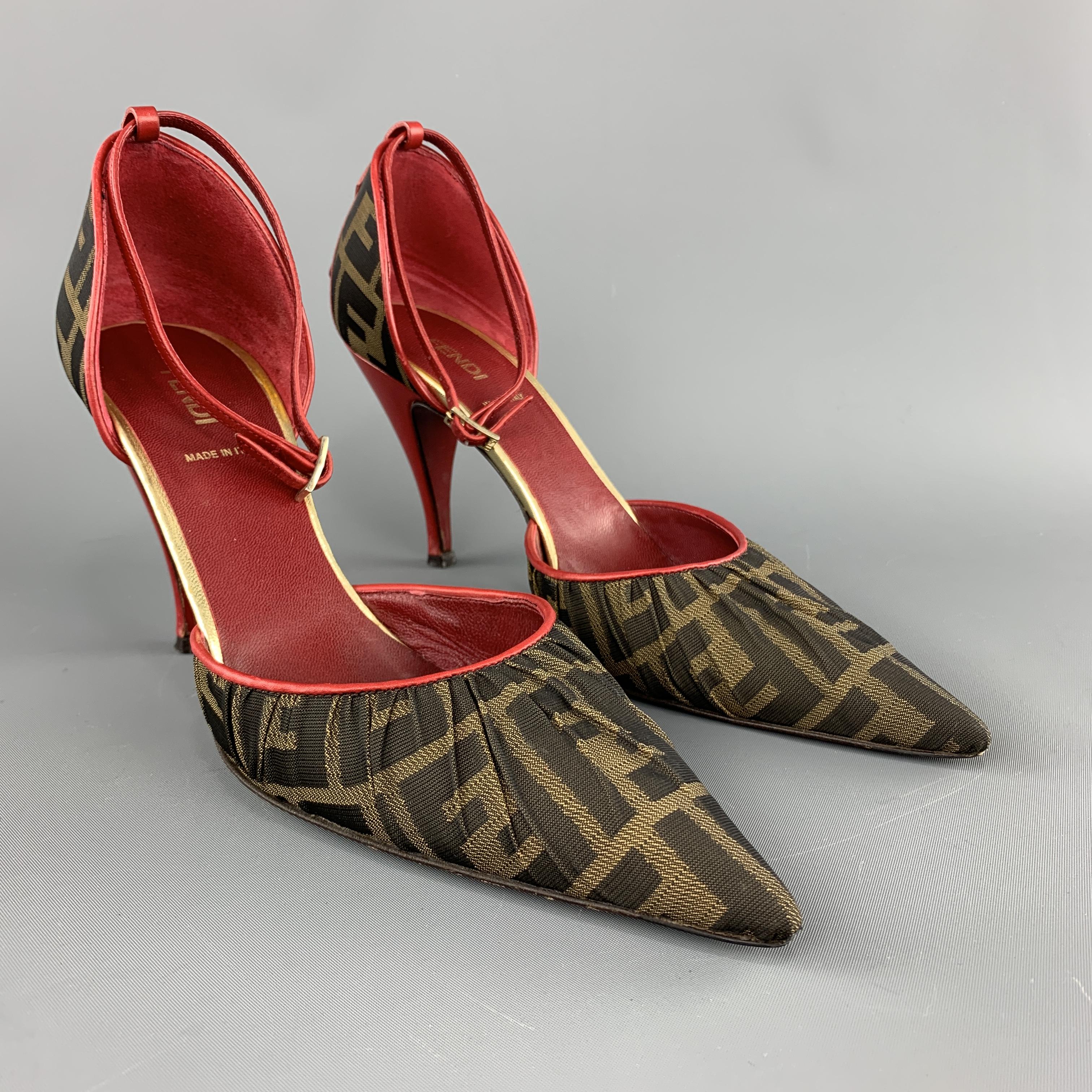 FENDI pumps come in brown monogram Zucca FF canvas with a gathered pointed toe, red leather trim, ankle strap, studded heel, and leather covered stiletto. Minor wear. As-is. Made in Italy.

Very Good Pre-Owned Condition.
Marked: IT 38

Heel: 4 in. 