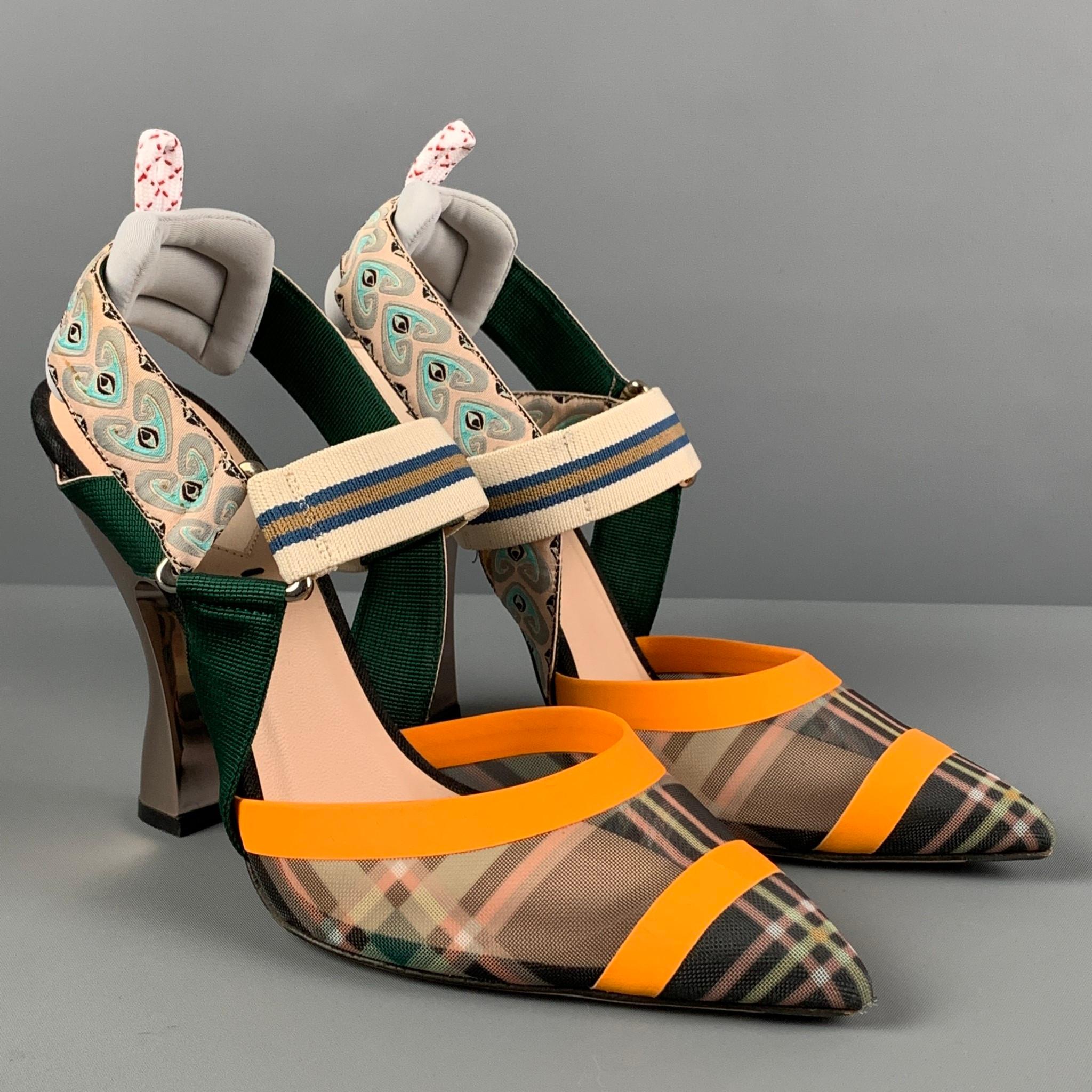 FENDI pumps comes in a multi-color colibri tartan mixed material featuring a pointed toe, mesh panel, and a mirrored heel. Made in Italy. 

Very Good Pre-Owned Condition.
Marked: 38
Original Retail Price: $995.00

Measurements:

Heel: 4.25 in. 