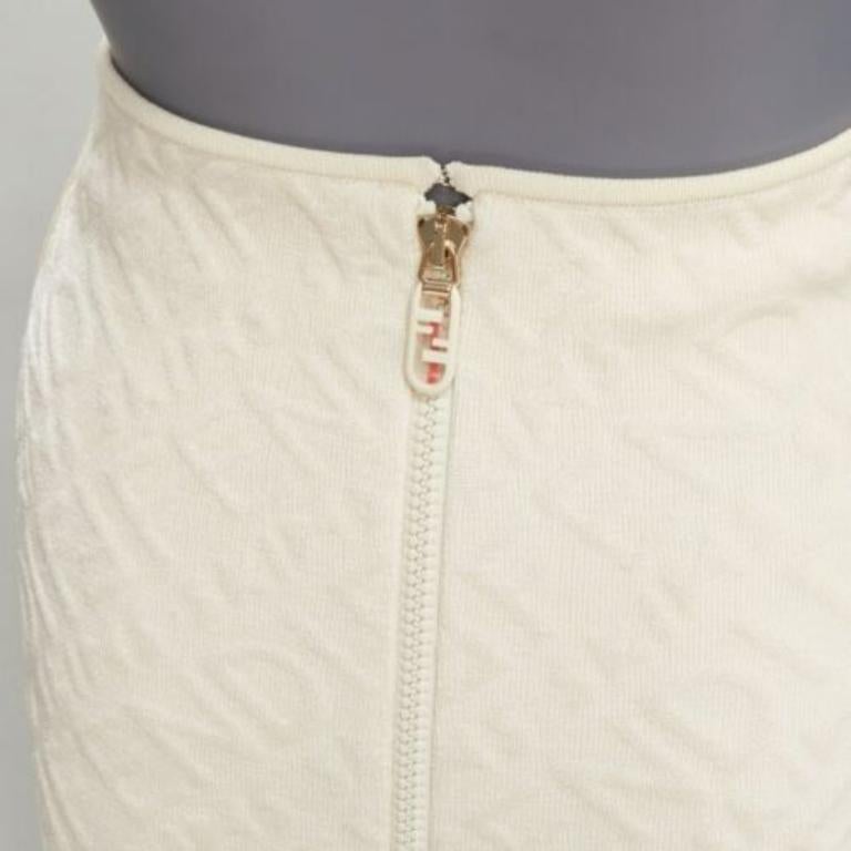FENDI SKIMS cream logo jacquard high waisted pencil skirt IT36 XXS
Reference: LNKO/A02243
Brand: Fendi
Collection: Skims
Material: Viscose, Blend
Color: Cream
Pattern: Monogram
Closure: Zip
Extra Details: Two way zip at back with FF logo.
Made in:
