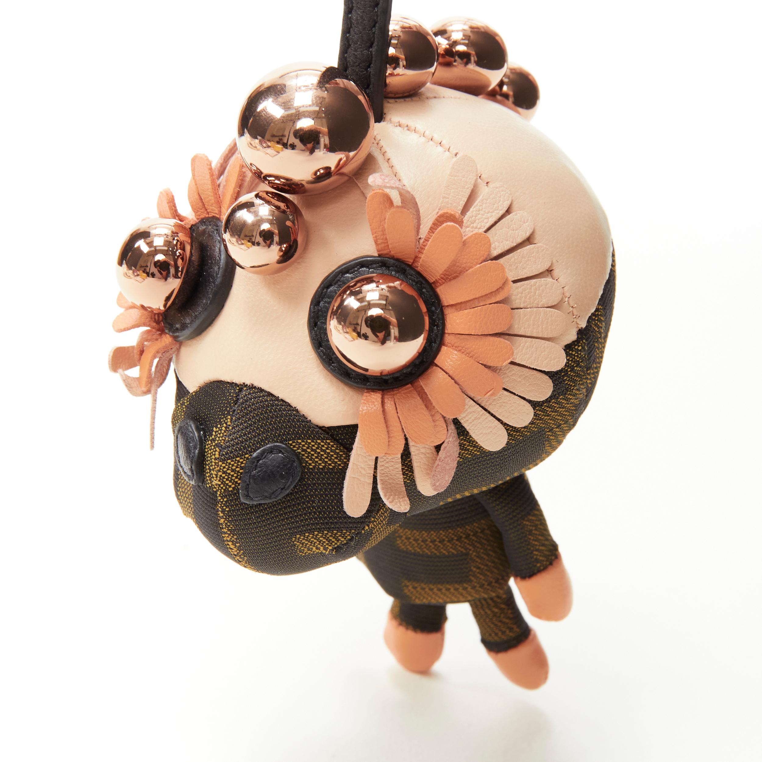 FENDI Space Monkey Zucca FF monogram floral rose gold stud keyring bag charm 
Reference: ANWU/A00117 
Brand: Fendi 
Collection: Space Monkey 
Material: Canvas 
Color: Brown 
Pattern: Monogram 
Closure: Clasp 
Extra Detail: Brown Zucca FF monogram