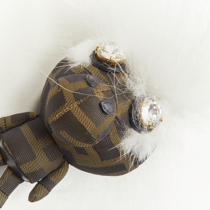 FENDI Space Monkey Zucca FF monogram white fur crystal keyring bag charm
Reference: ANWU/A00116
Brand: Fendi
Model: Space Monkey
Material: Canvas, Fur
Color: Brown, White
Pattern: Solid
Closure: Clasp
Extra Details: Brown Zucca FF monogram upper.