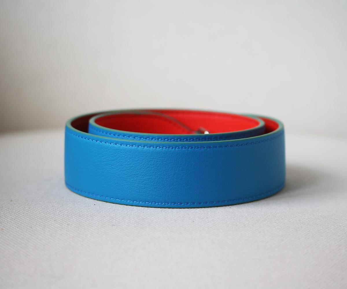 Fendi's bag strap is crafted from supple bright-red and blue leather. This thick style is finished with green trims and designed to attach to your favourite tote for hands-free wear. Bright-red and blue leather. Lobster clasp fastenings. Made in