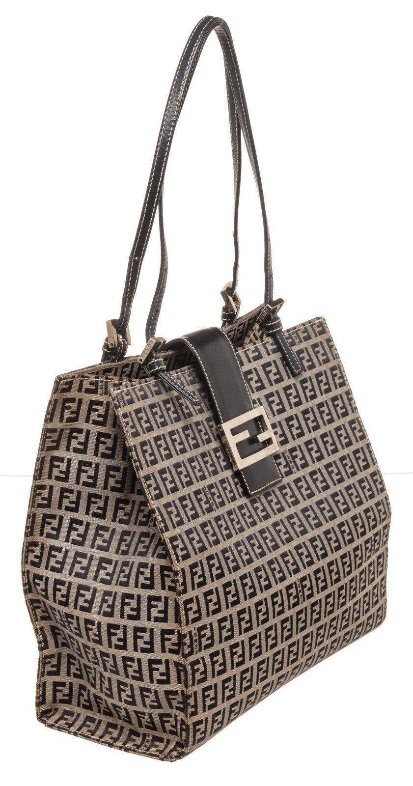 Fendi Tan Canvas Leather Zucca Tote Bag with dark brown leather trim, brown canvas lining, three interior compartments; center with zip top.