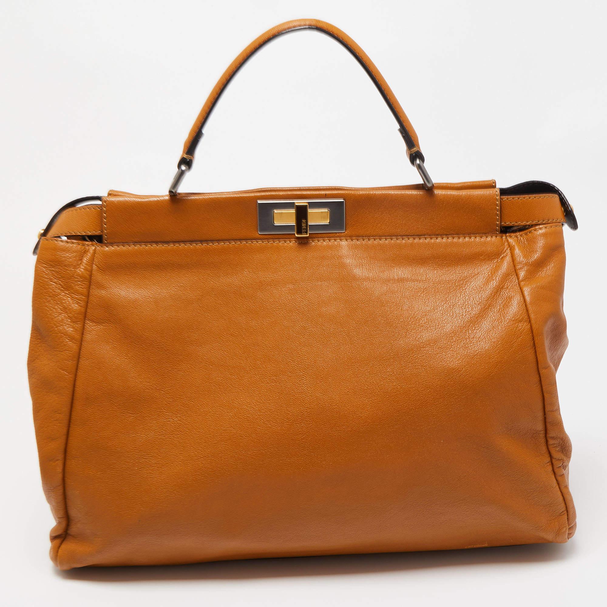 Exuding unparalleled elegance and sophistication, this bag is made from the finest material in a gorgeous hue. While the roomy interior offers ample space, the top handle allows you to carry it with much elegance.

