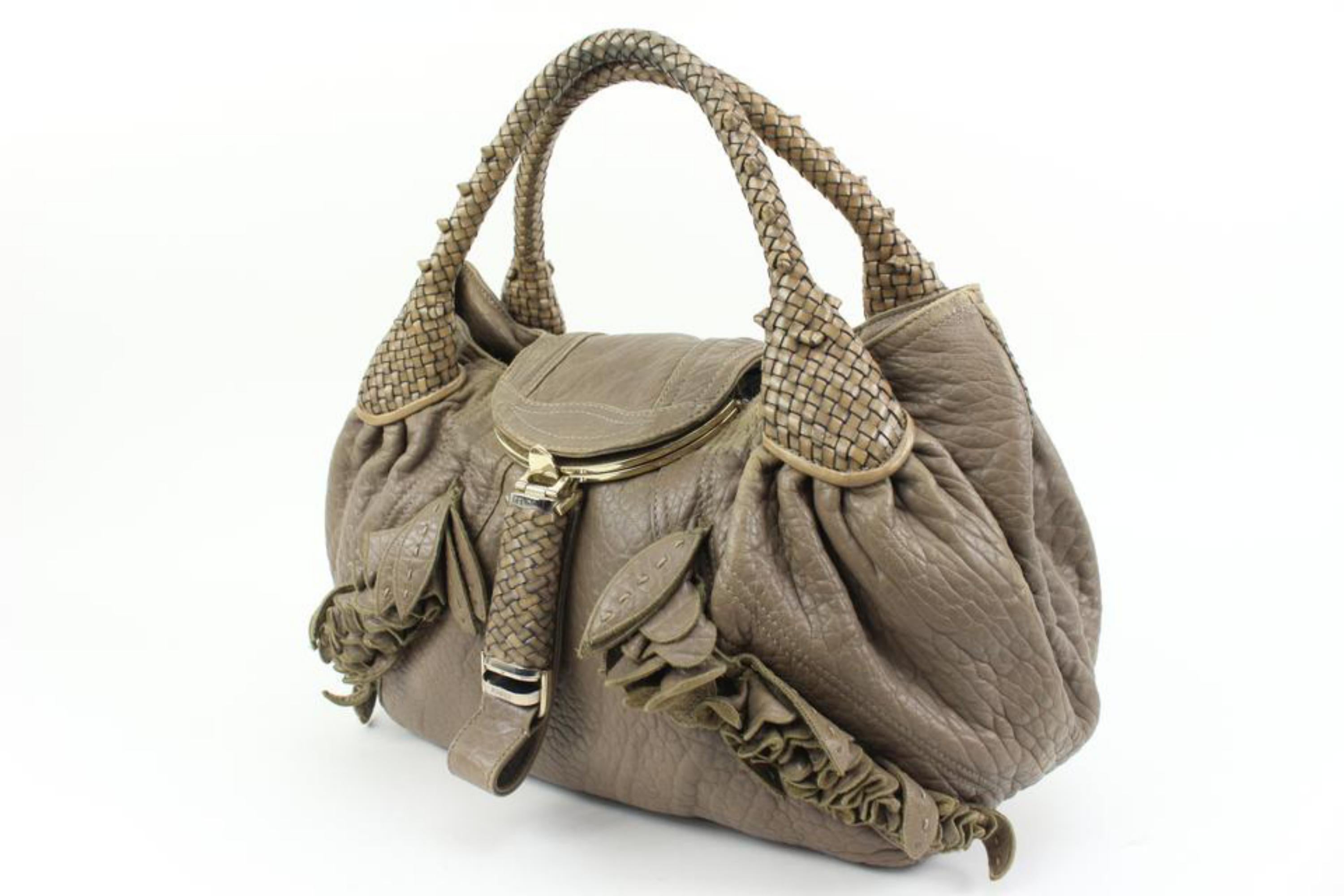 Fendi Taupe Nappa Wisteria Spy Hobo 6f323s
Date Code/Serial Number: 2373-8BR511-UN2-069
Made In: Italy
Measurements: Length:  17