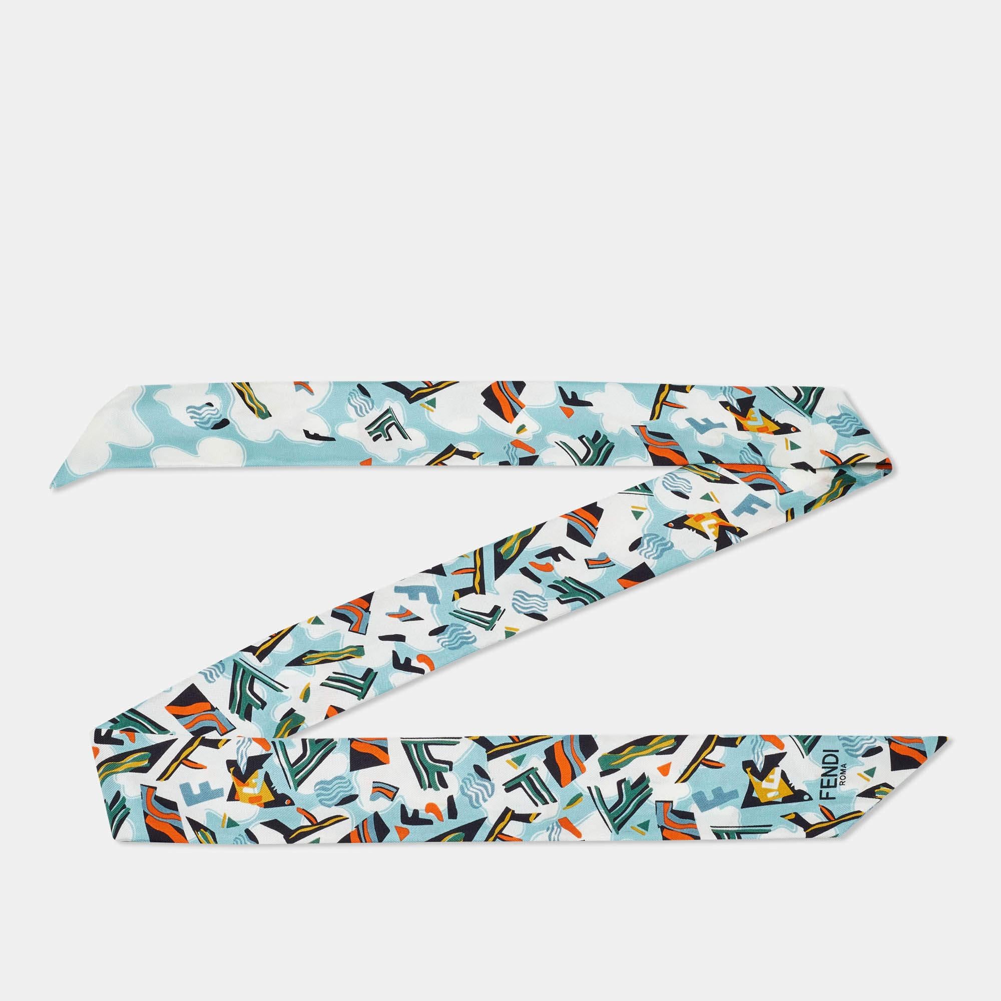 The bandeau is a luxurious fashion accessory. Made from high quality silk it features beautiful colors with intricate prints. This versatile piece can be worn as a neck scarf headband or tied to a handbag adding a touch of elegance to any outfit.