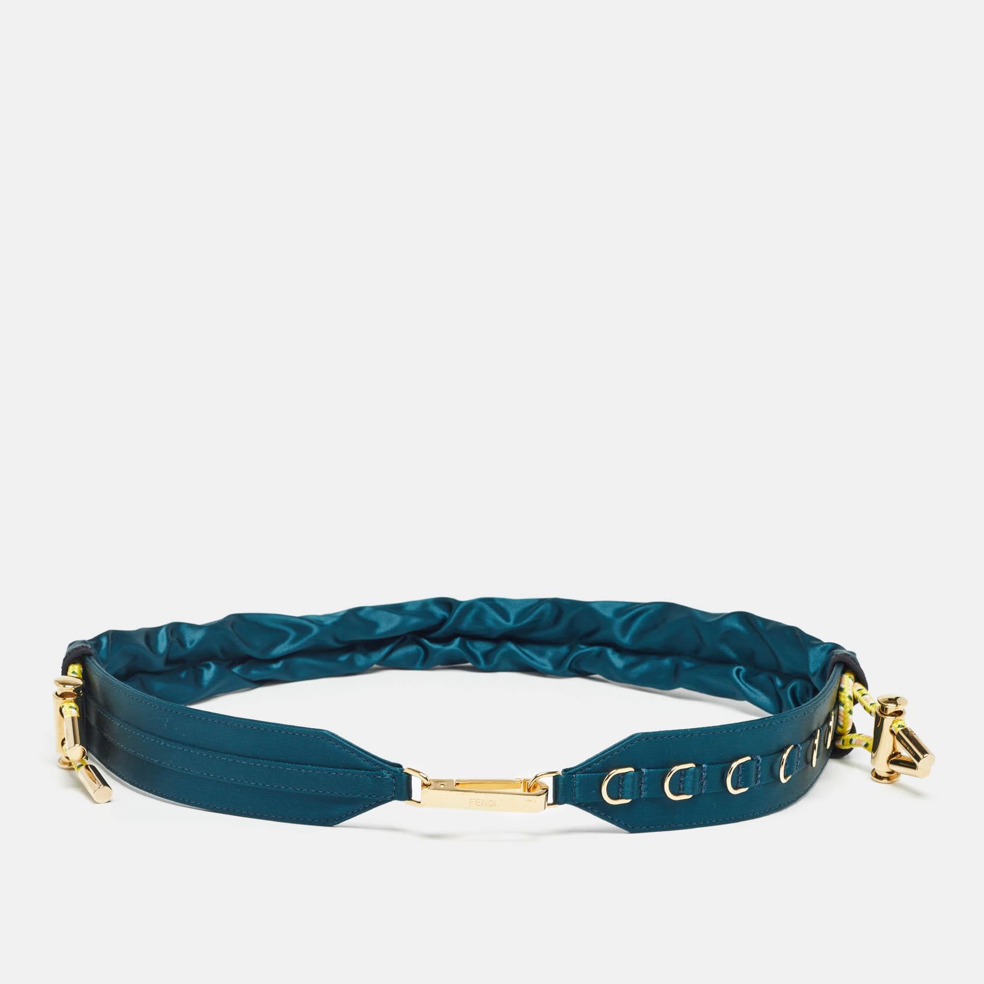 Fendi brings you this chic shoulder strap to carry your handbags in different ways. The strap is made from satin and gold tone metal.