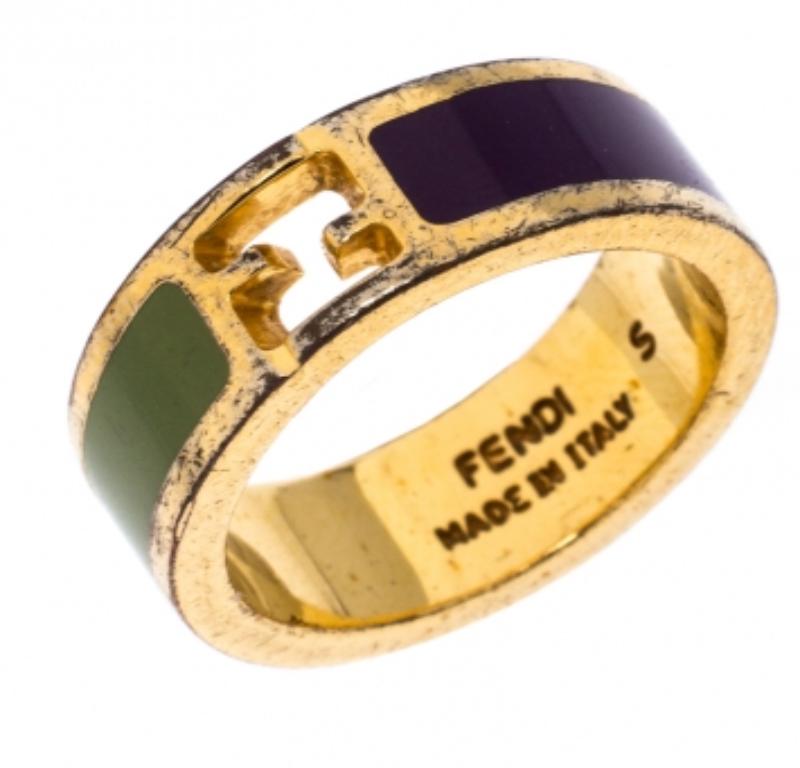 This classy and elegant The Fendista ring by Fendi is made with gold-tone metal and is coated with enamel. It features the Fendi logo cutout at the center. Simple and distinctive, this ring deserves to be yours.

