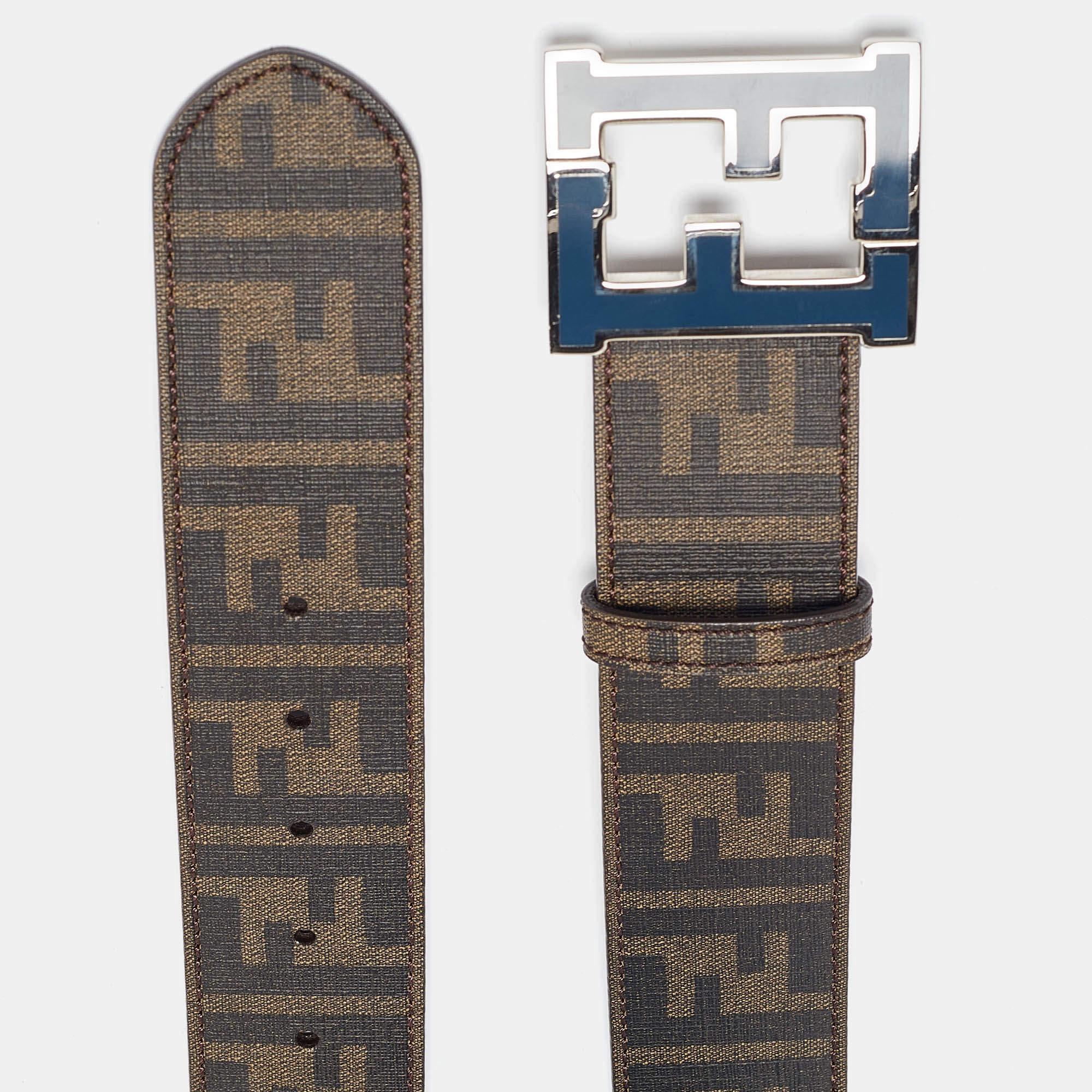 Established in 1925 the House of Fendi is known for its luxury goods and fine craftsmanship. Textured monogram coated canvas lends casual appeal to this Italian made leather belt finished with signature FF logo buckle.