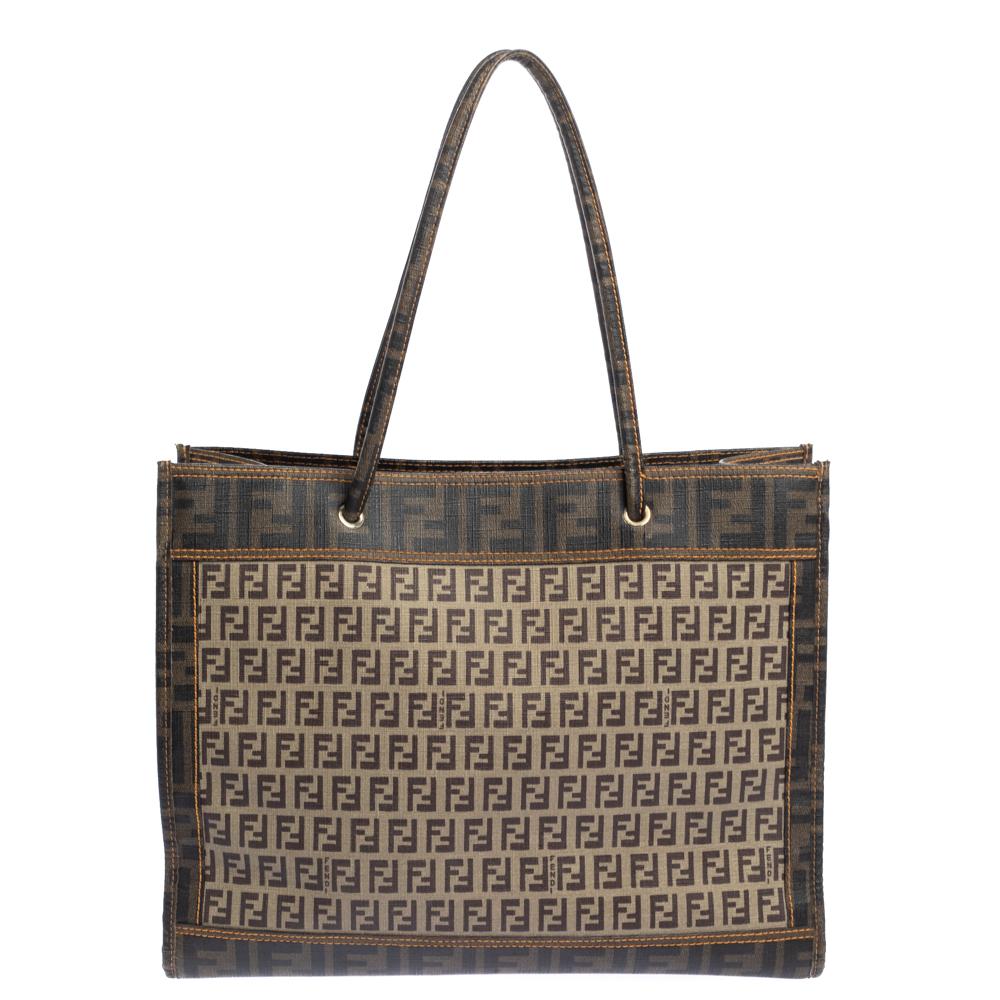 Impressive and high on style, this shopper tote from Fendi comes made from the signature coated canvas. It has dual top handles and the interior offers a lot of space just so that you can easily carry your daily essentials.

