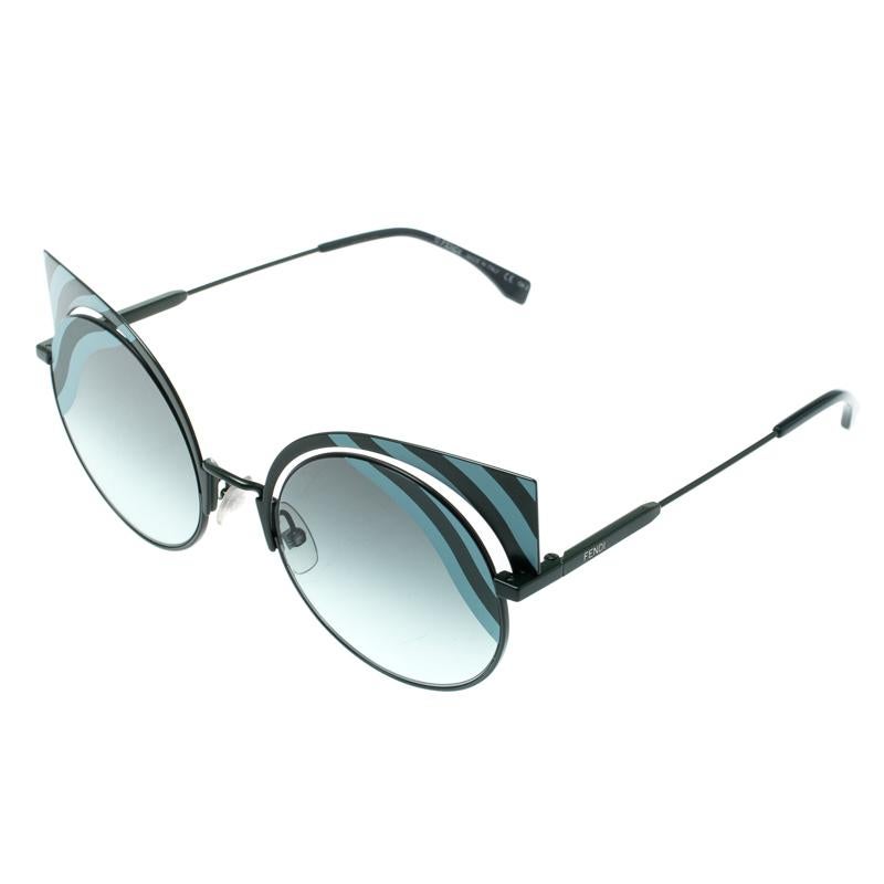 These cool sunglasses are a must buy for a unique look. Made in the combination of acetate and silver-tone metal, this Hypnoshine piece features green gradient lenses and exaggerated cat-eye tips. A fabulous accessory to rock your style!

Includes: