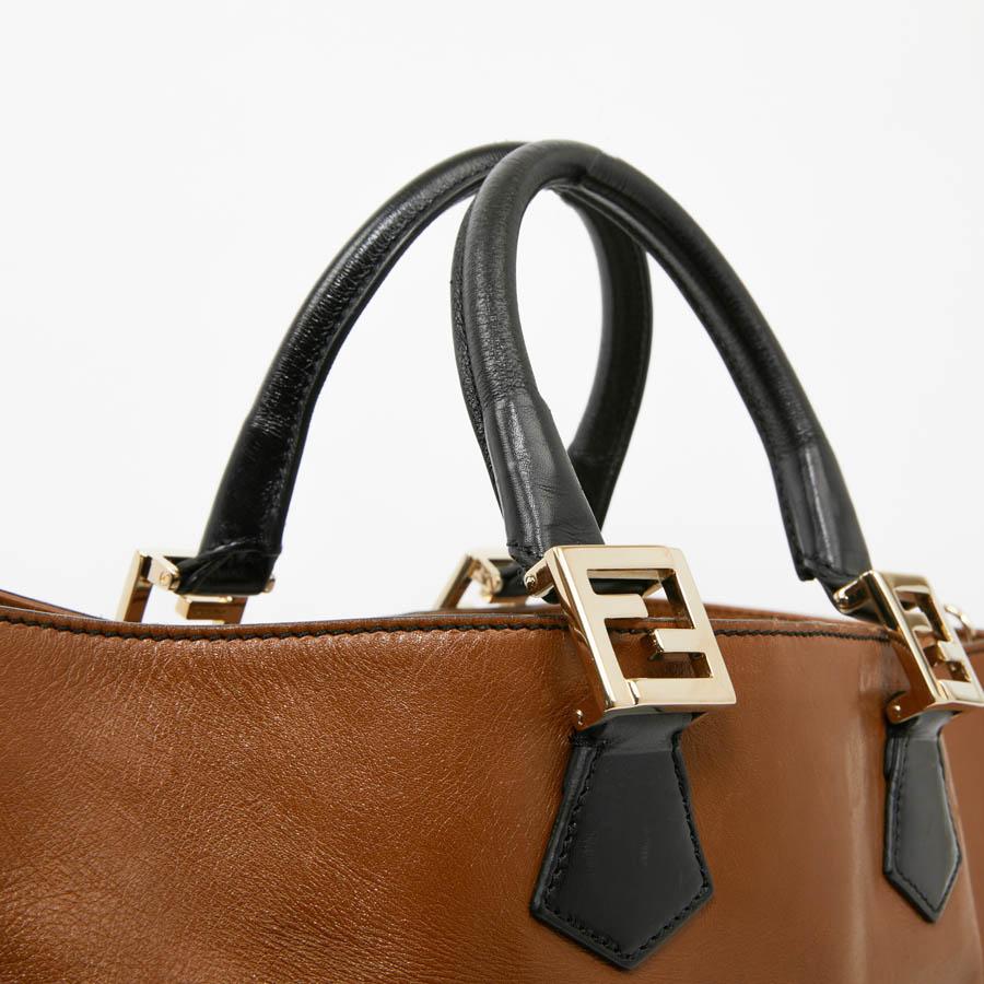 black and brown two tone leather handbag