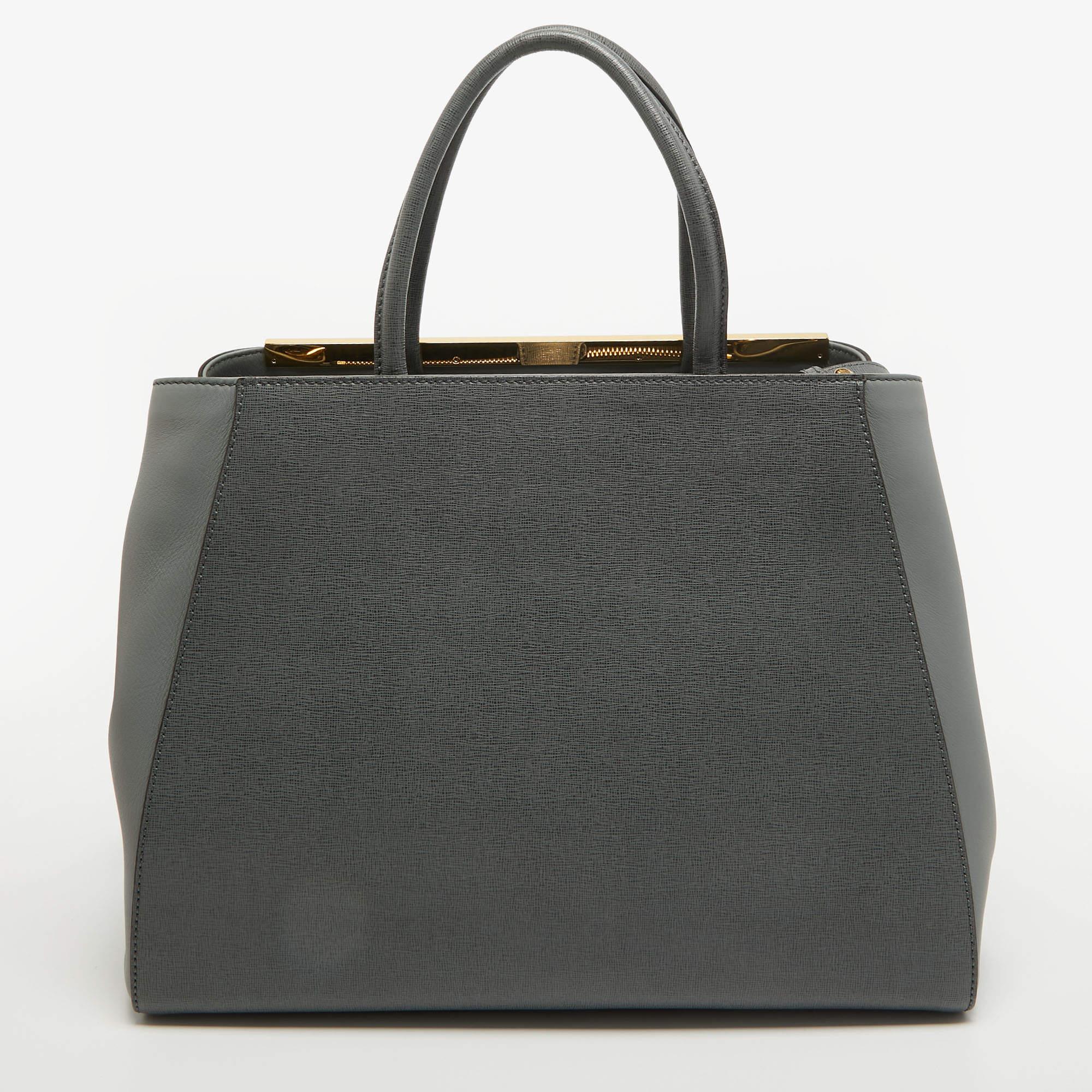 Fendi's 2Jours tote is one of the most iconic designs from the label and it still continues to receive the love of women around the world. Crafted from leather, the bag features double-rolled handles and an optional shoulder strap. It is equipped