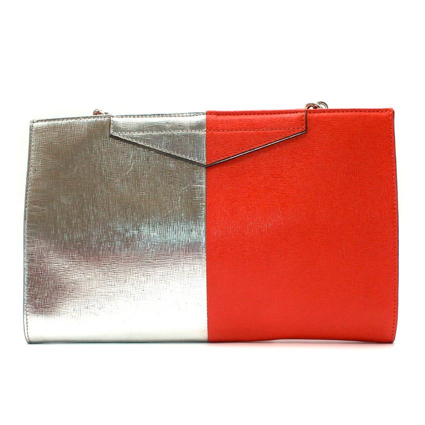Fendi Two-tone red & silver leather clutch

-Red and silver leather clutch
-Silver tone chain 
-Magnetic closure
-Two interior pockets

Please note, these items are pre-owned and may show signs of being stored even when unworn and unused. This is